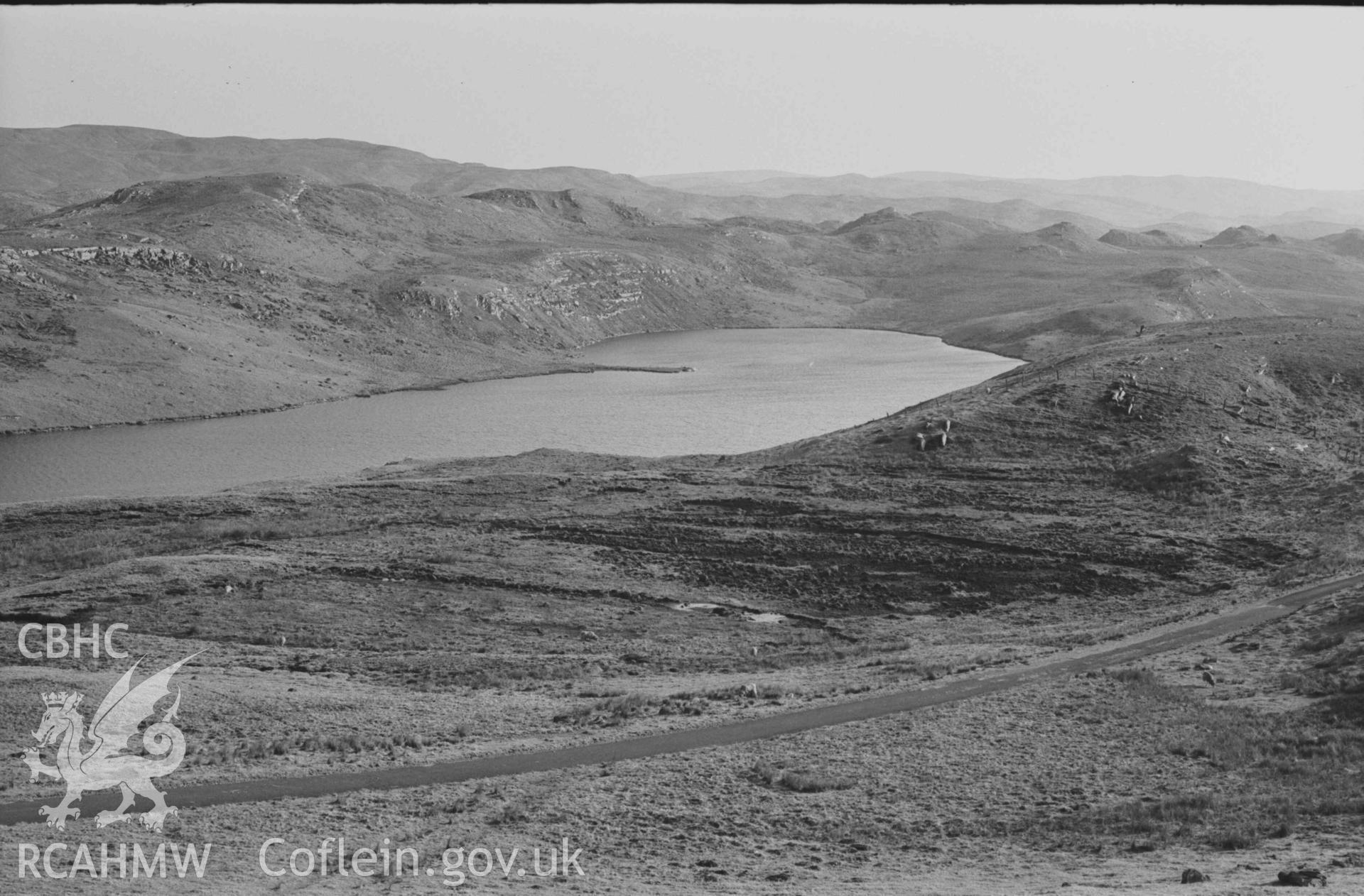 Digital copy of a black and white negative showing Llyn Hir and Llyn Teifi from Groes Wnws; 17:45hrs. (Panorama, photograph 2 of 3). Photographed by Arthur Chater on 8 April 1969. Looking south from Grid Reference SN 7860 6810.