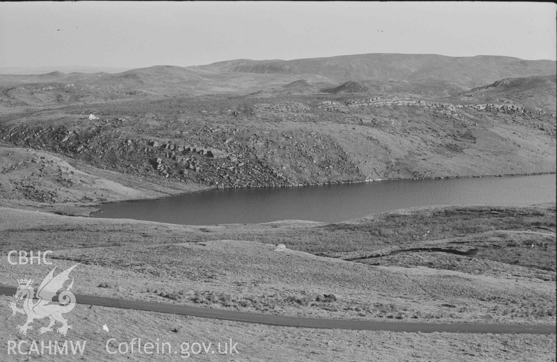 Digital copy of a black and white negative showing Llyn Hir and Llyn Teifi from Groes Wnws; 17:45hrs. (Panorama, photograph 1 of 3). Photographed by Arthur Chater on 8 April 1969. Looking east south east from Grid Reference SN 7860 6810.