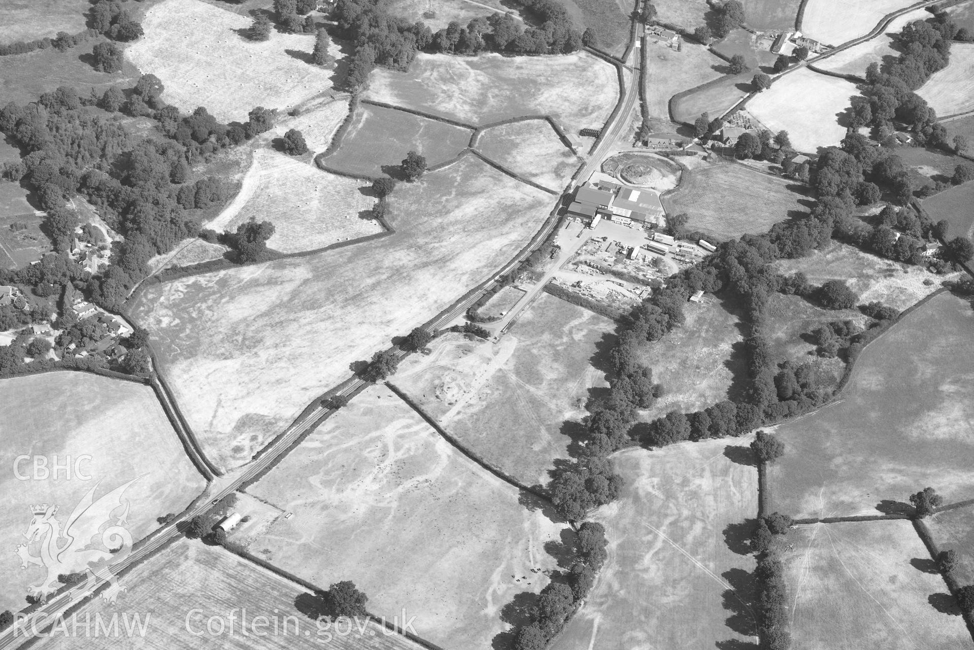 Castell Trefilan. Oblique black and white aerial photograph taken during the Royal Commission’s programme of archaeological aerial reconnaissance by Toby Driver on 10 July 2018.