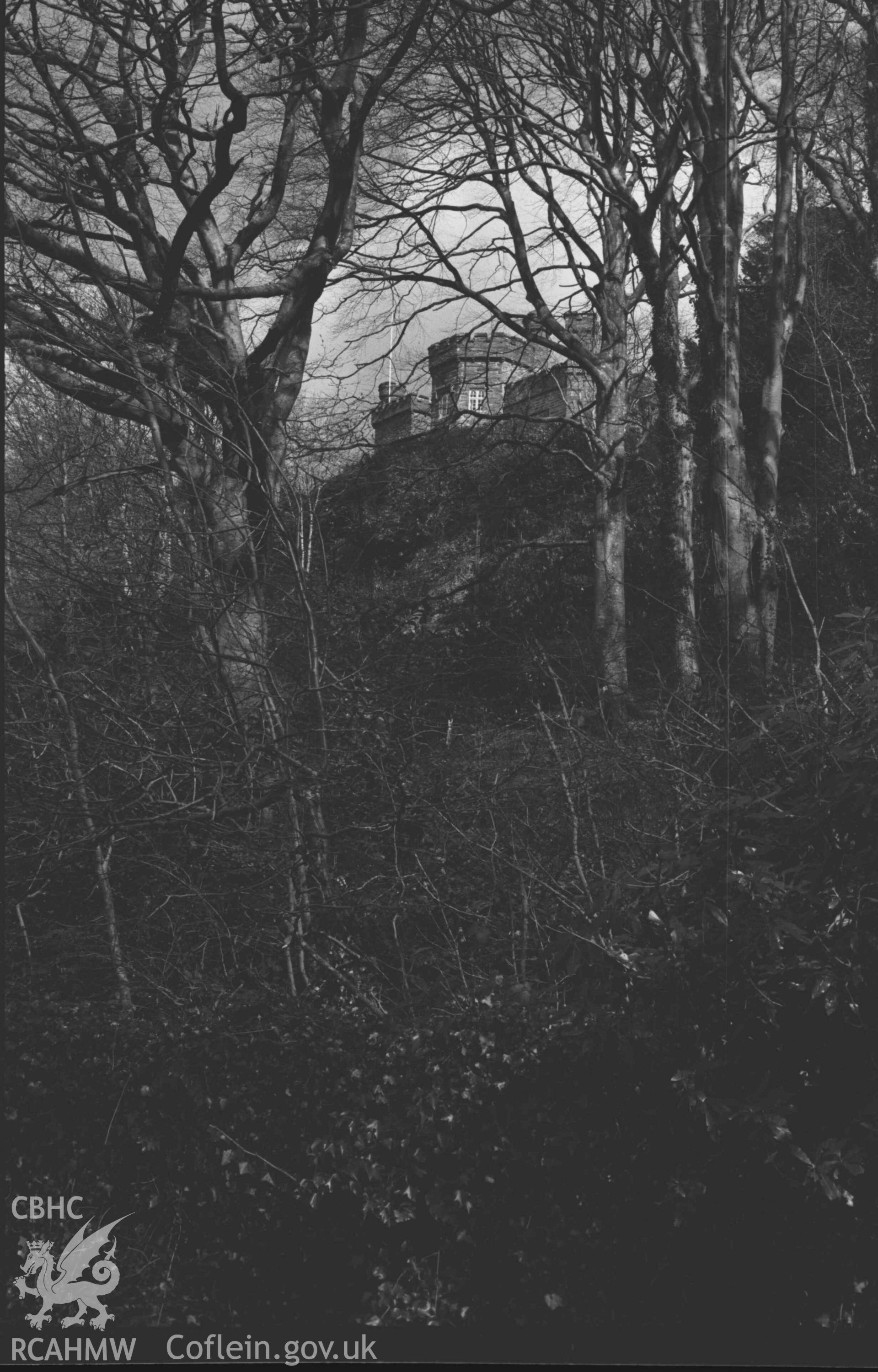 Digital copy of a black and white negative showing Glandyfi Castle from the main road. Photographed by Arthur Chater on 12 April 1969. Looking east south east from Grid Reference SN 6912 9670.