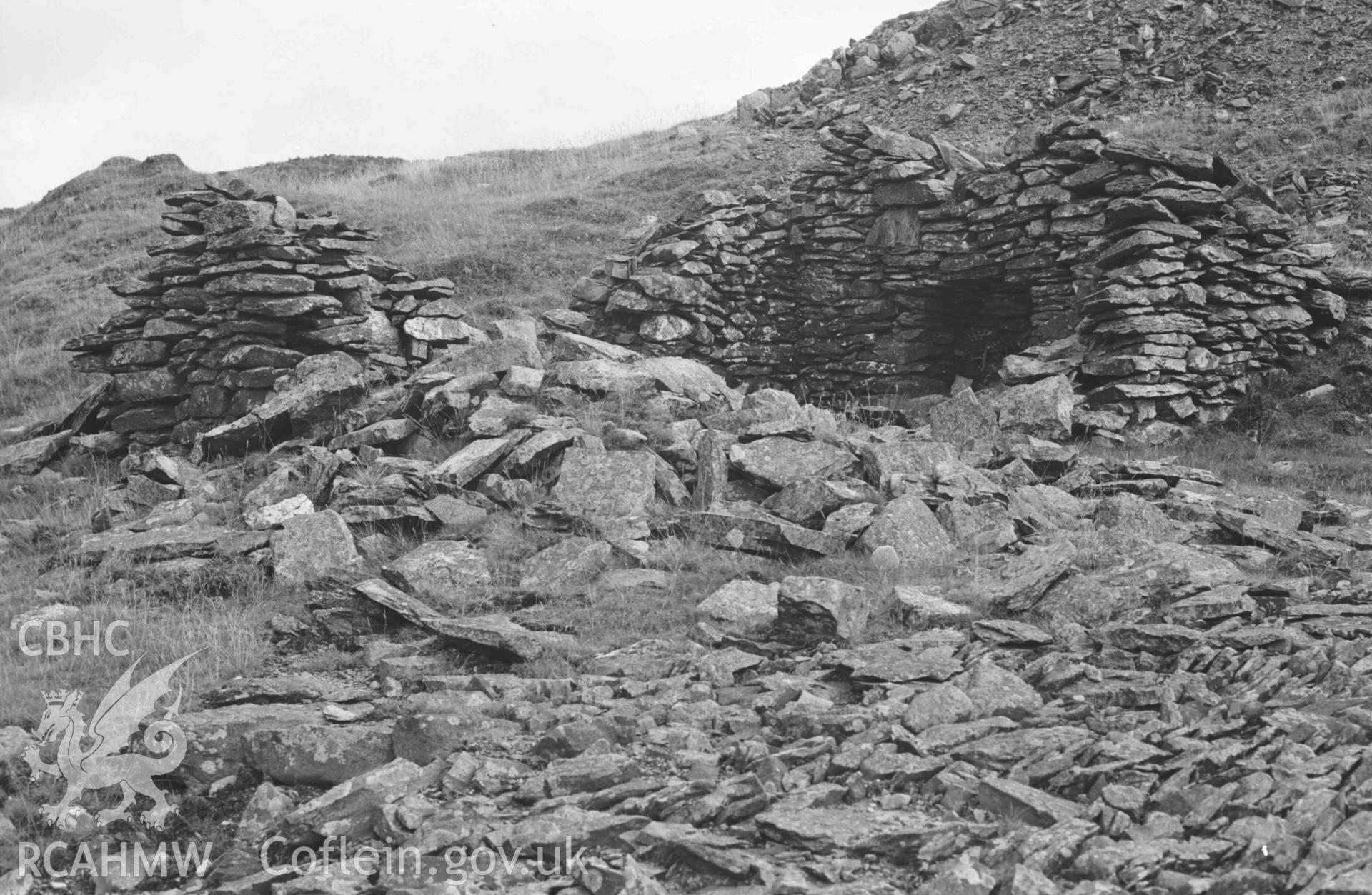 Digital copy of a black and white negative showing Rhysgog lead mine - ruins with chimney. Photographed by Arthur Chater on 23 August 1969. Looking south east from Grid Reference SN 6807 5380.