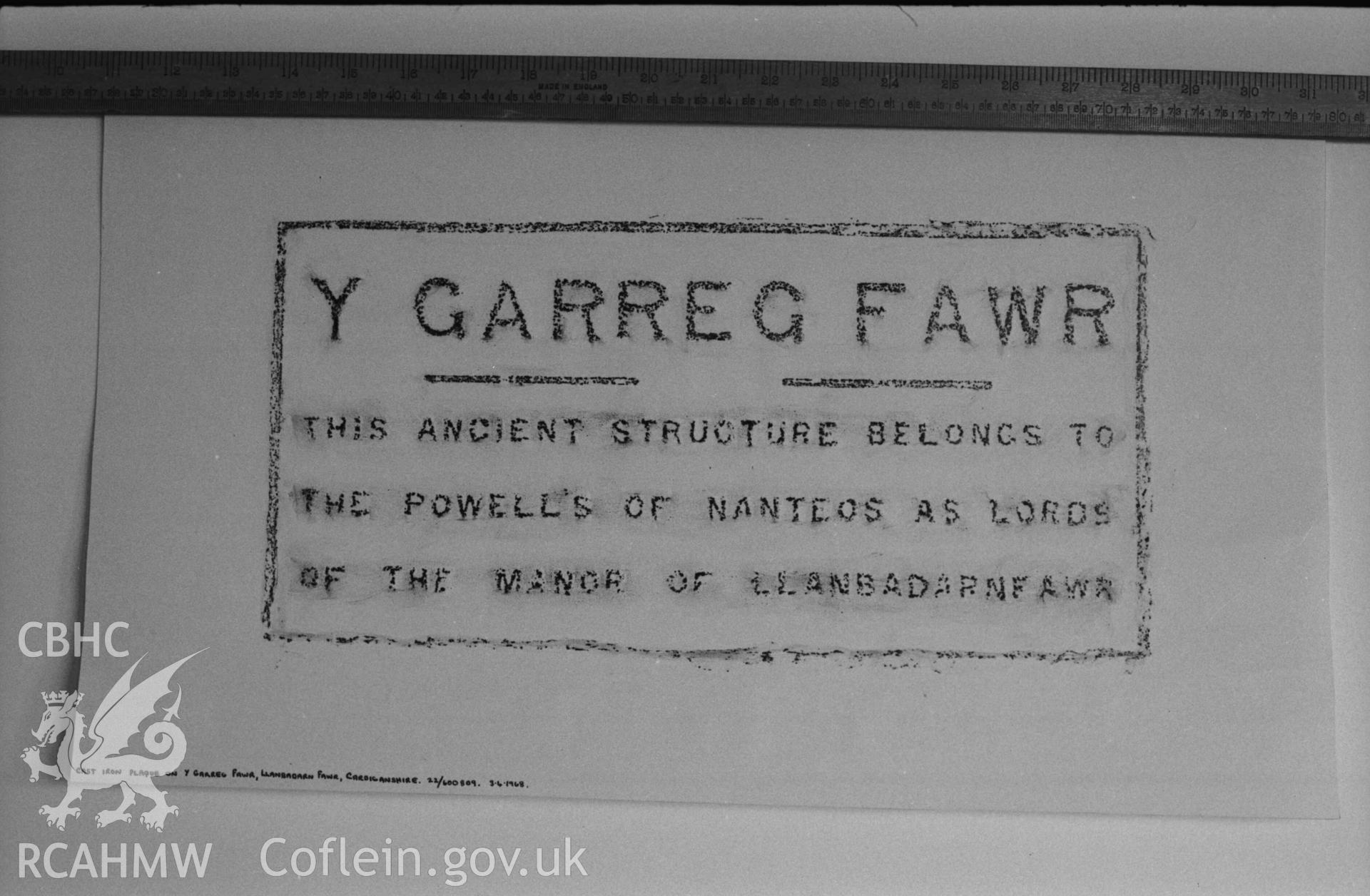 Digital copy of a black and white negative showing rubbing of cast iron plaque on Y Garreg Fawr, Llanbadarn Fawr. Produced by Arthur Chater on 26 August 1969.