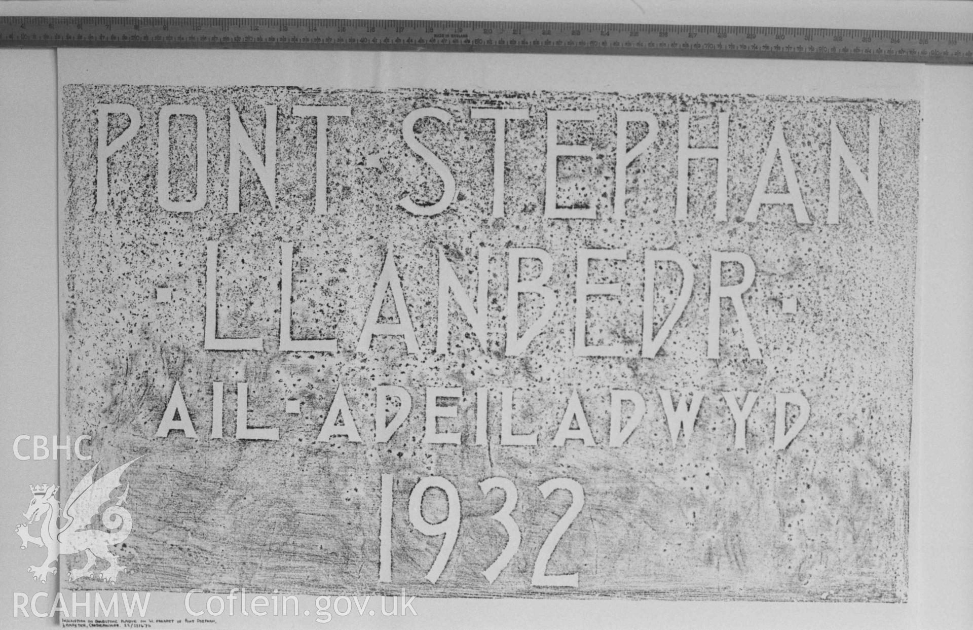 Digital copy of a black and white negative showing inscription on sandstone plaque on the west parapet of Pont Steffan, Lampeter. Produced by Arthur Chater on 26 August 1969.