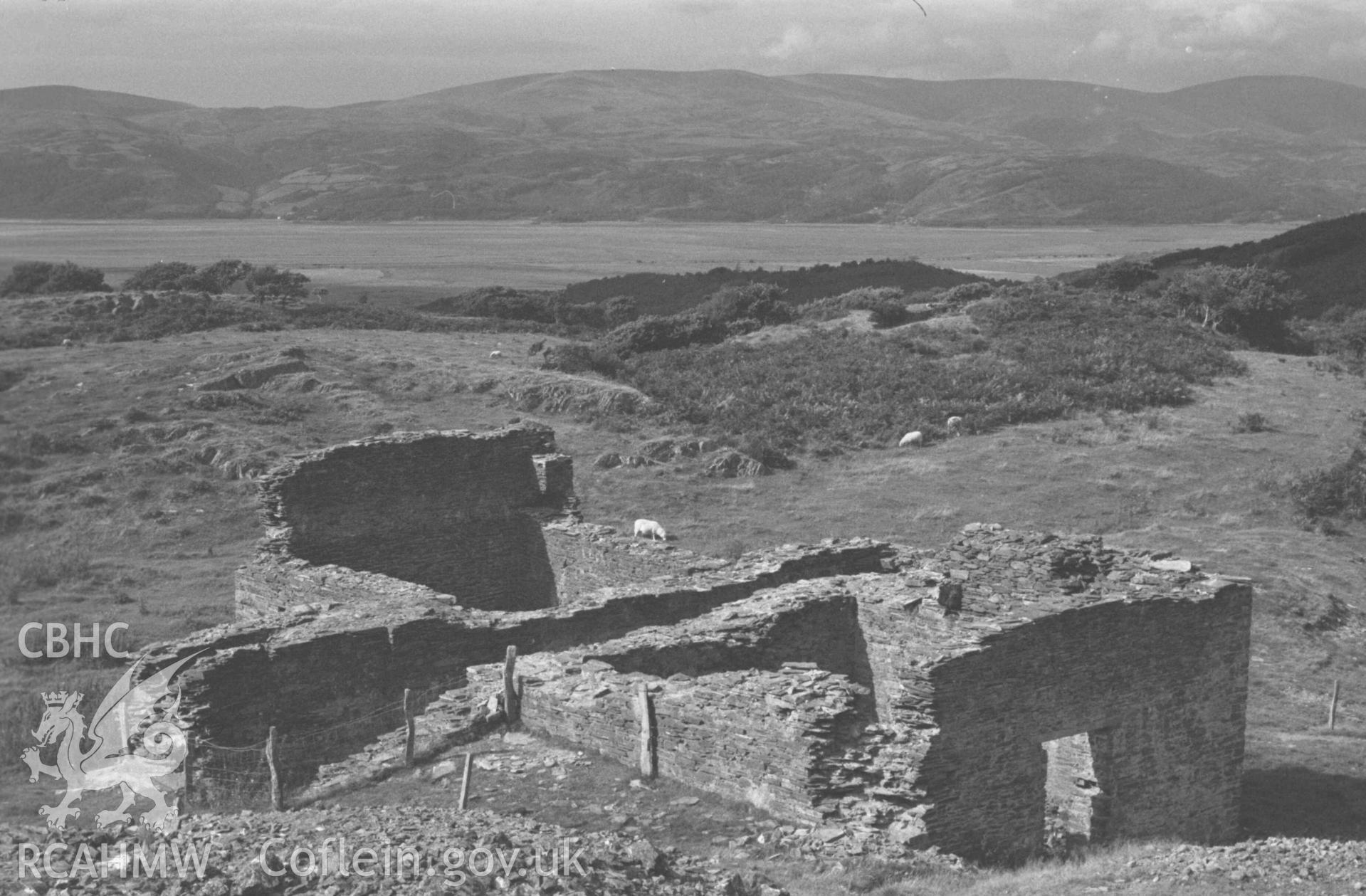 Digital copy of a black and white negative showing mine ruins 300m west of Gwar-Cwm-Isaf, at 600ft. Photographed by Arthur Chater on 27 August 1969, looking north from Grid Reference SN 6646 9160.