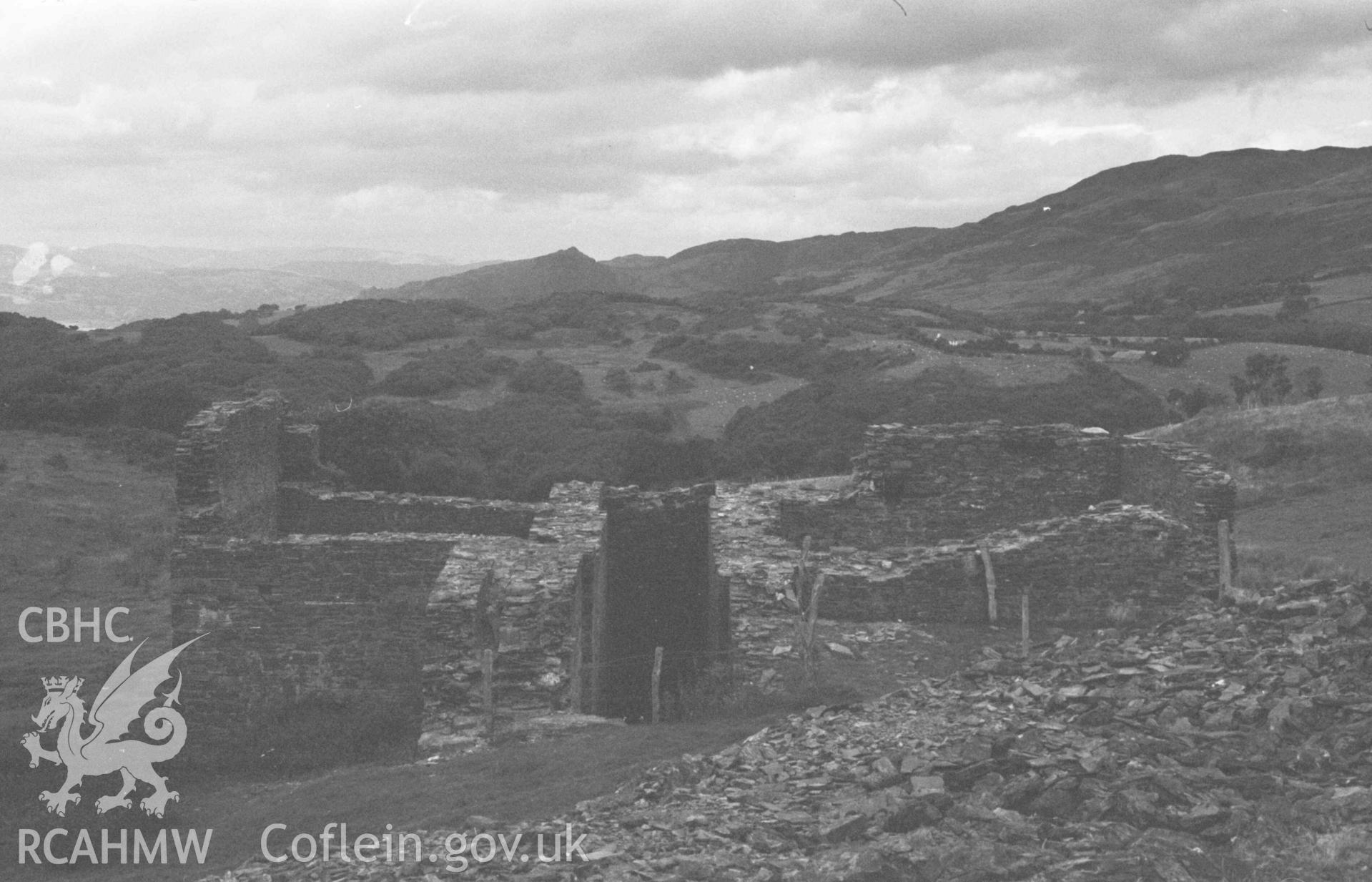 Digital copy of a black and white negative showing view across mine ruin 300m west of Gwar-Cwm-Isaf; Foel Fawr and Foel Goch in distance. Photographed by Arthur Chater on 27 August 1969, looking north east from Grid Reference SN 6645 9160.