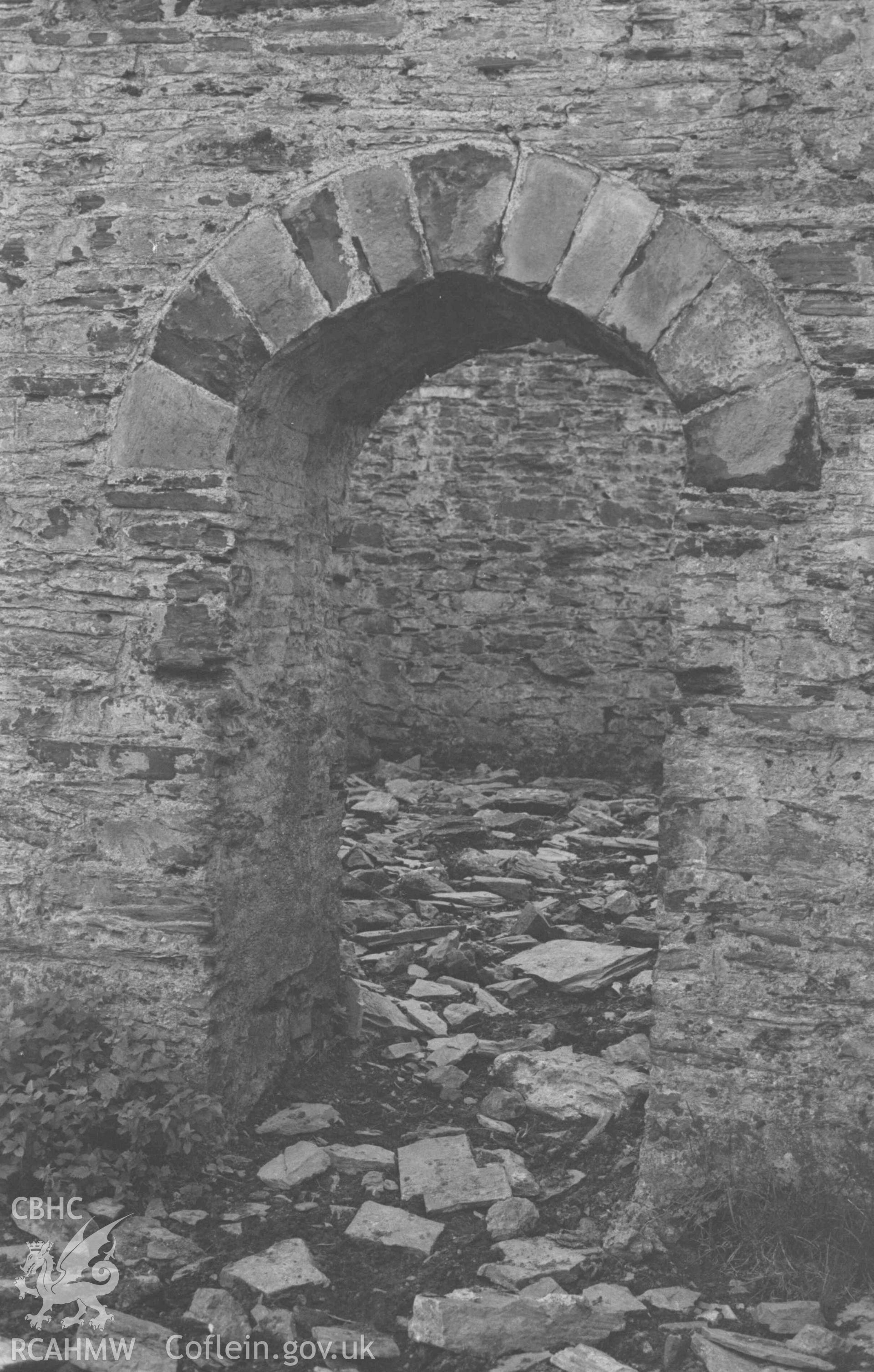 Digital copy of a black and white negative showing doorway in mine ruin 300m west of Gwar-Cwm-Isaf. Photographed by Arthur Chater on 27 August 1969, looking south west from Grid Reference SN 6647 9162.