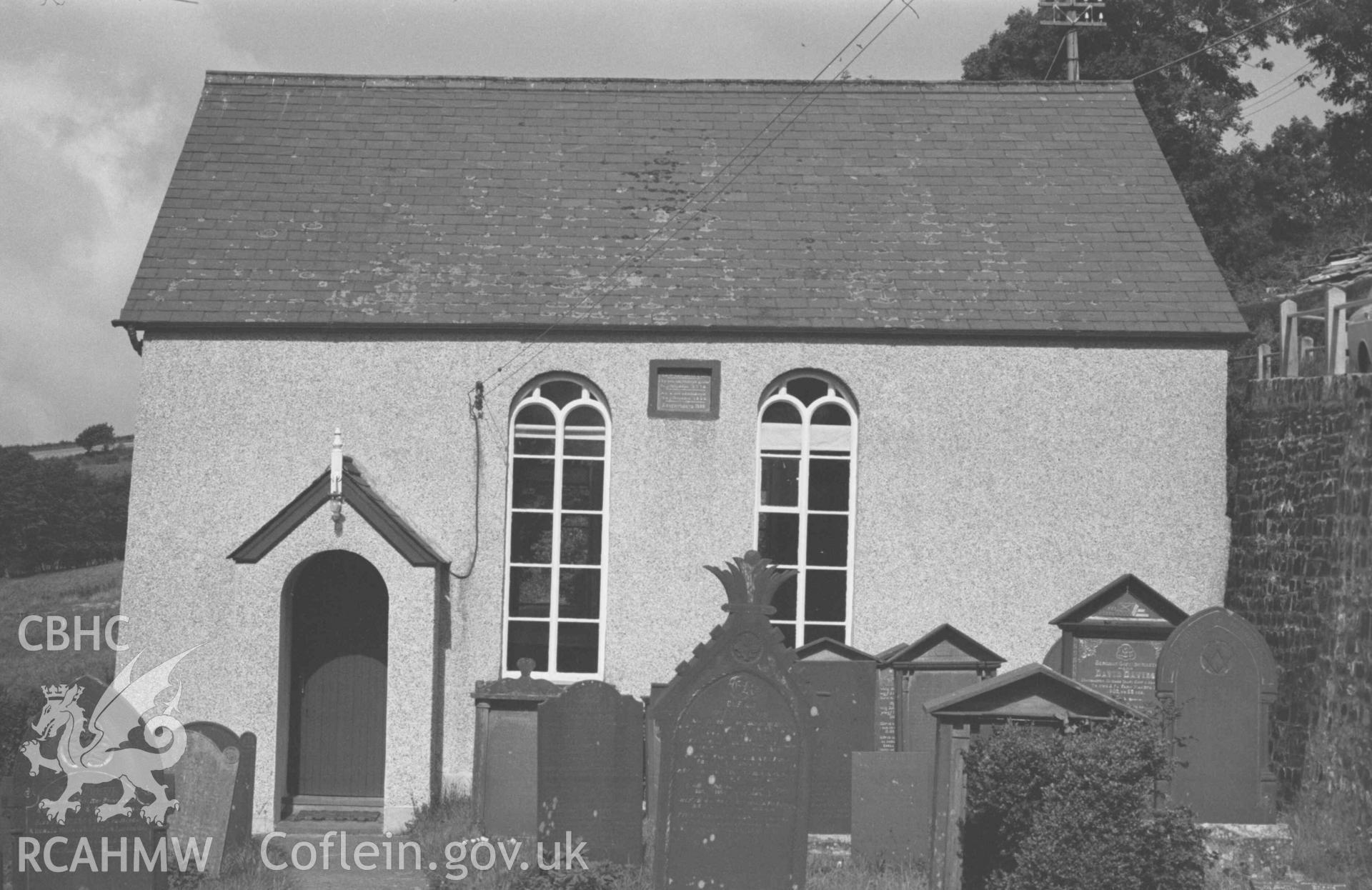 Digital copy of a black and white negative showing Capel Llwyndafydd (Baptist) from the graveyard. Photographed by Arthur Chater on 28 August 1969, looking north west from c. Grid Reference SN 3705 5558.