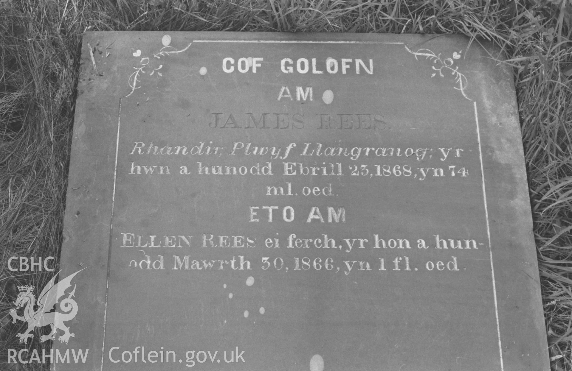 Digital copy of a black and white negative showing tombstone of James Rees from Rhandir at Capel Llwyndafydd graveyard. Photographed by Arthur Chater on 28 August 1969, Grid Reference SN 3703 5558.