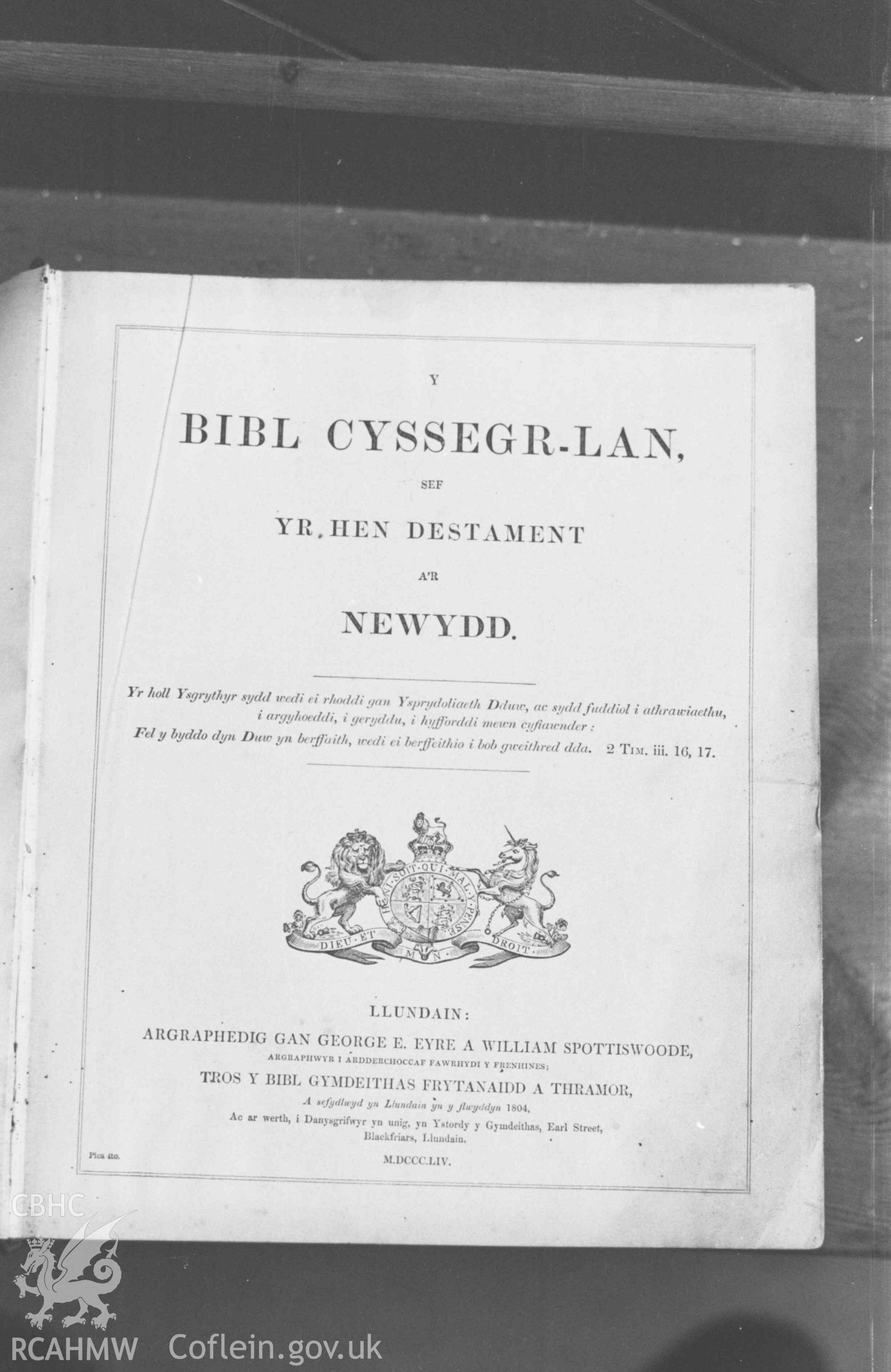 Digital copy of a black and white negative showing title page of old bible in (new) Capel Gwndwn, 1.5km west of Pentregat; possibly moved from the old chapel. Photographed by Arthur Chater on 28 August 1969, from Grid Reference SN 3401 5214.