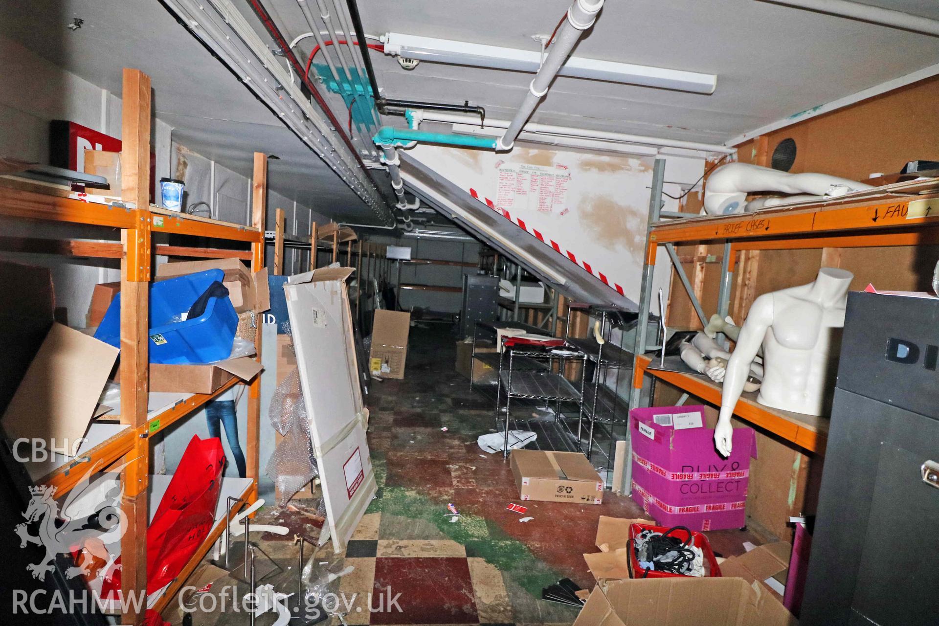 Photograph showing storeroom, from a Level 4 Historic Building Record of the former Howells Department Store, Cardiff. Conducted as a part of listed building consent by Purcell Architecture in 2024.