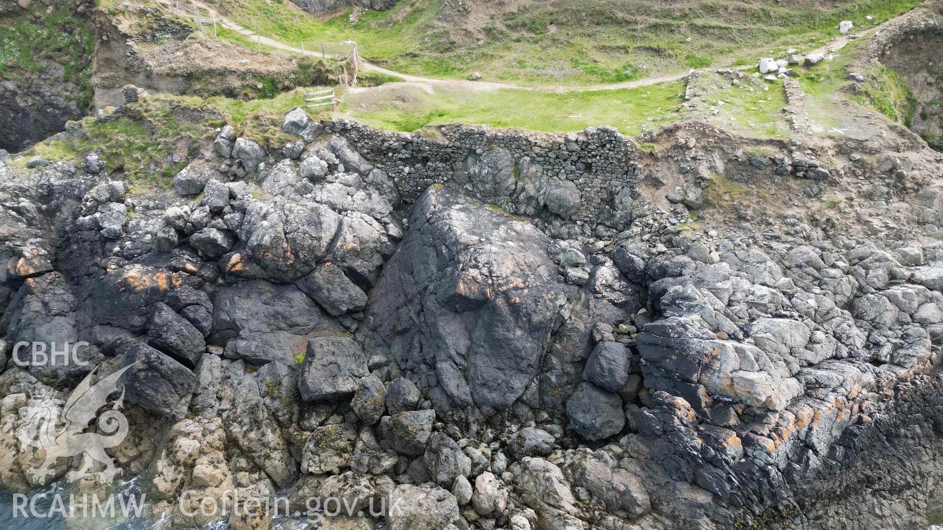 Low-level oblique view, looking east, of Penmaenmelyn copper mine on 24/04/2024. Scales are 1m.