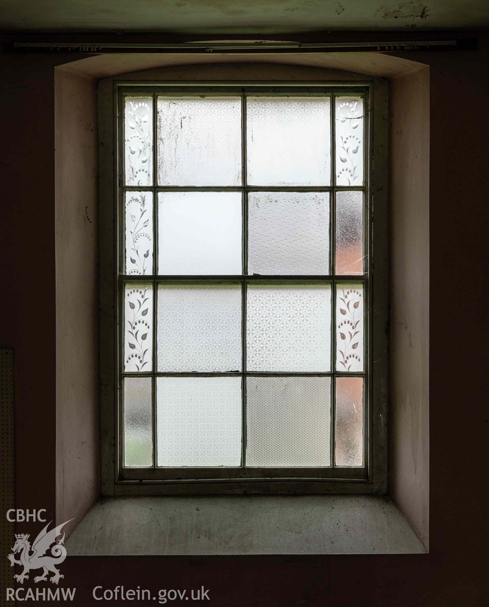 Capel Zion Baptist Chapel, Newtown - basement schoolroom, detail of window with decorative glazing.