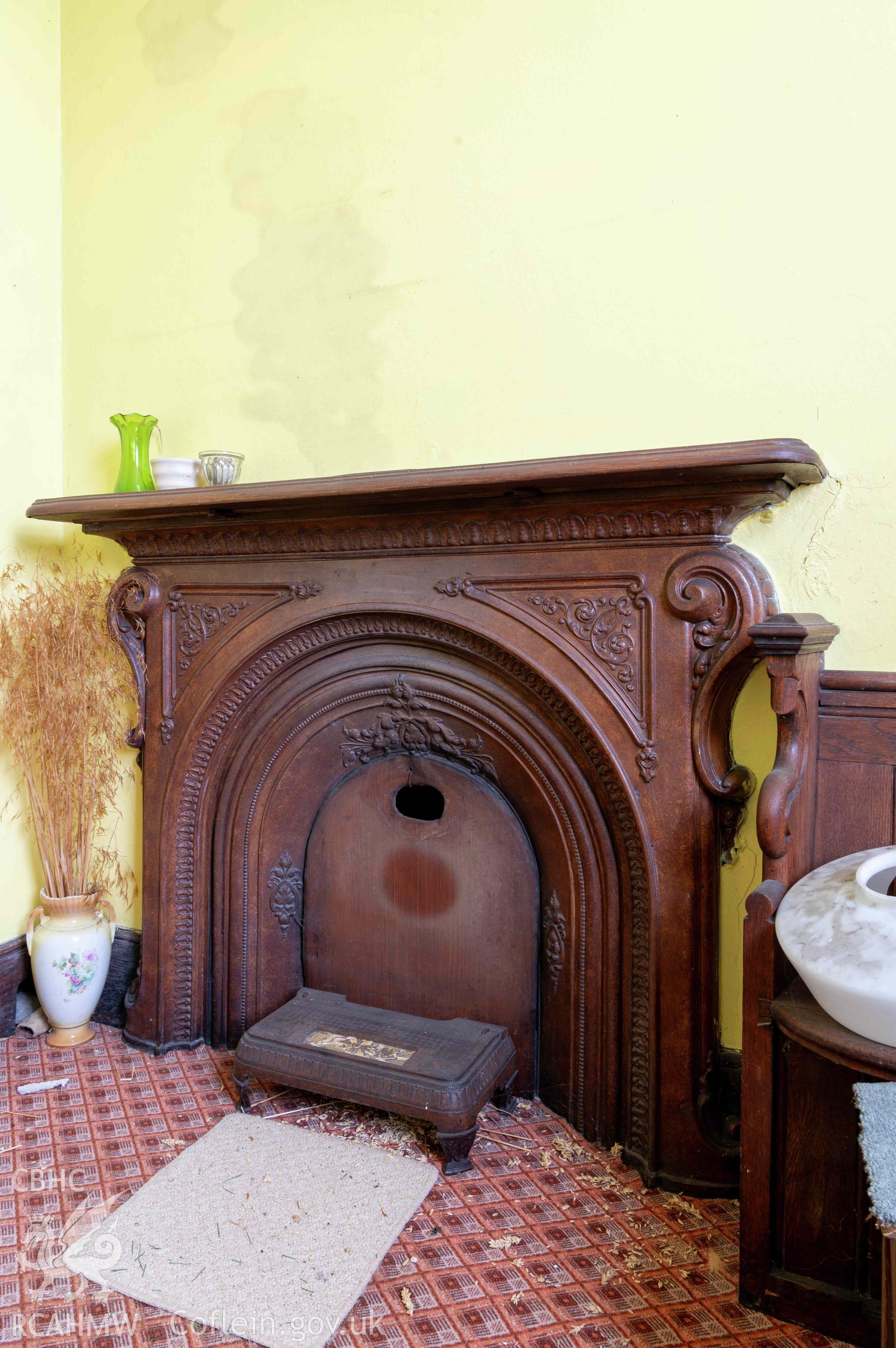 Capel Zion Baptist Chapel, Newtown - ground floor, north-east office room detail of fireplace.
