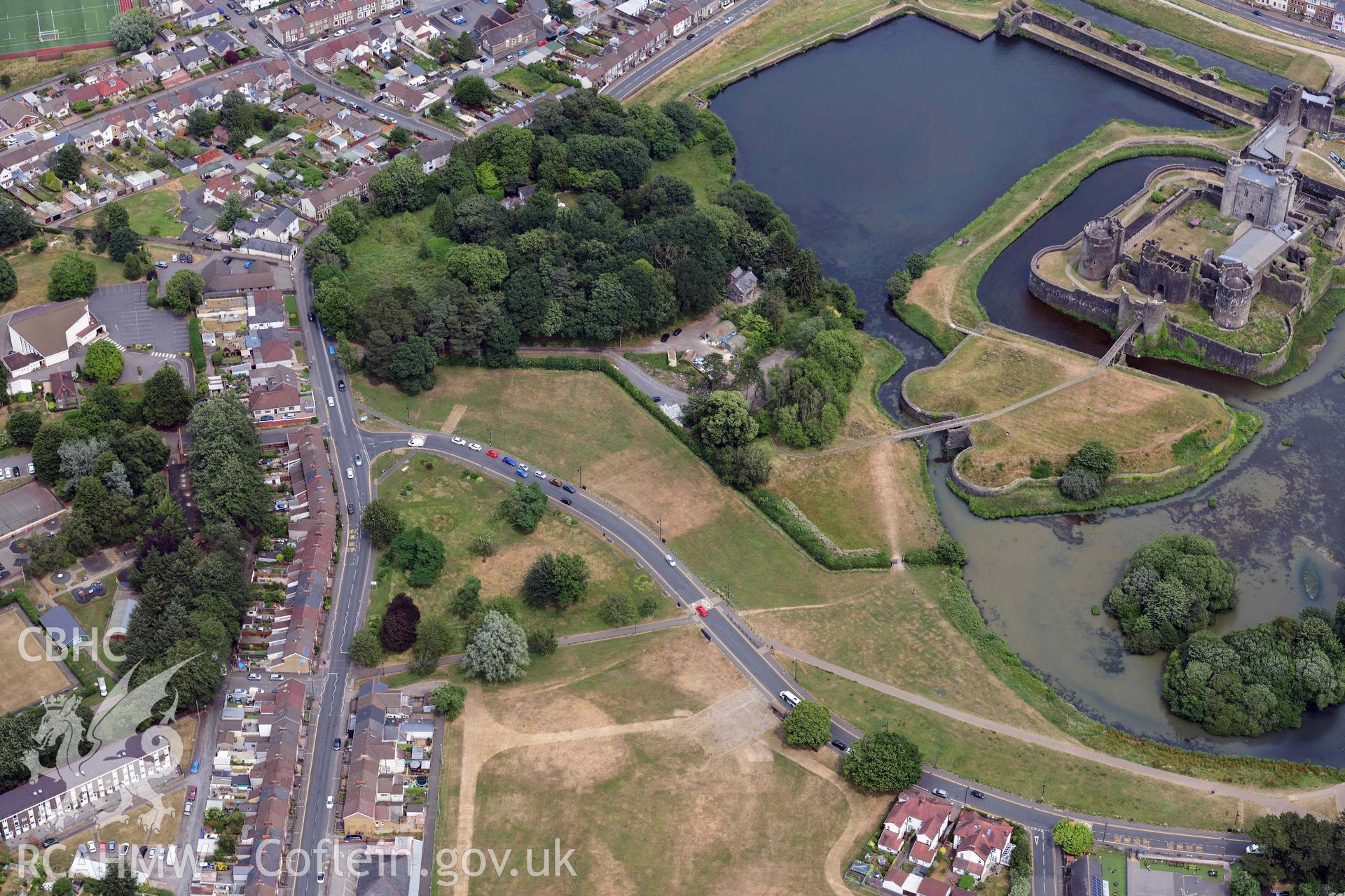 Aerial photograph of Caerphilly Castle. Oblique aerial photograph taken during the Royal Commission’s programme of archaeological aerial reconnaissance by Toby Driver on 26 June 2023