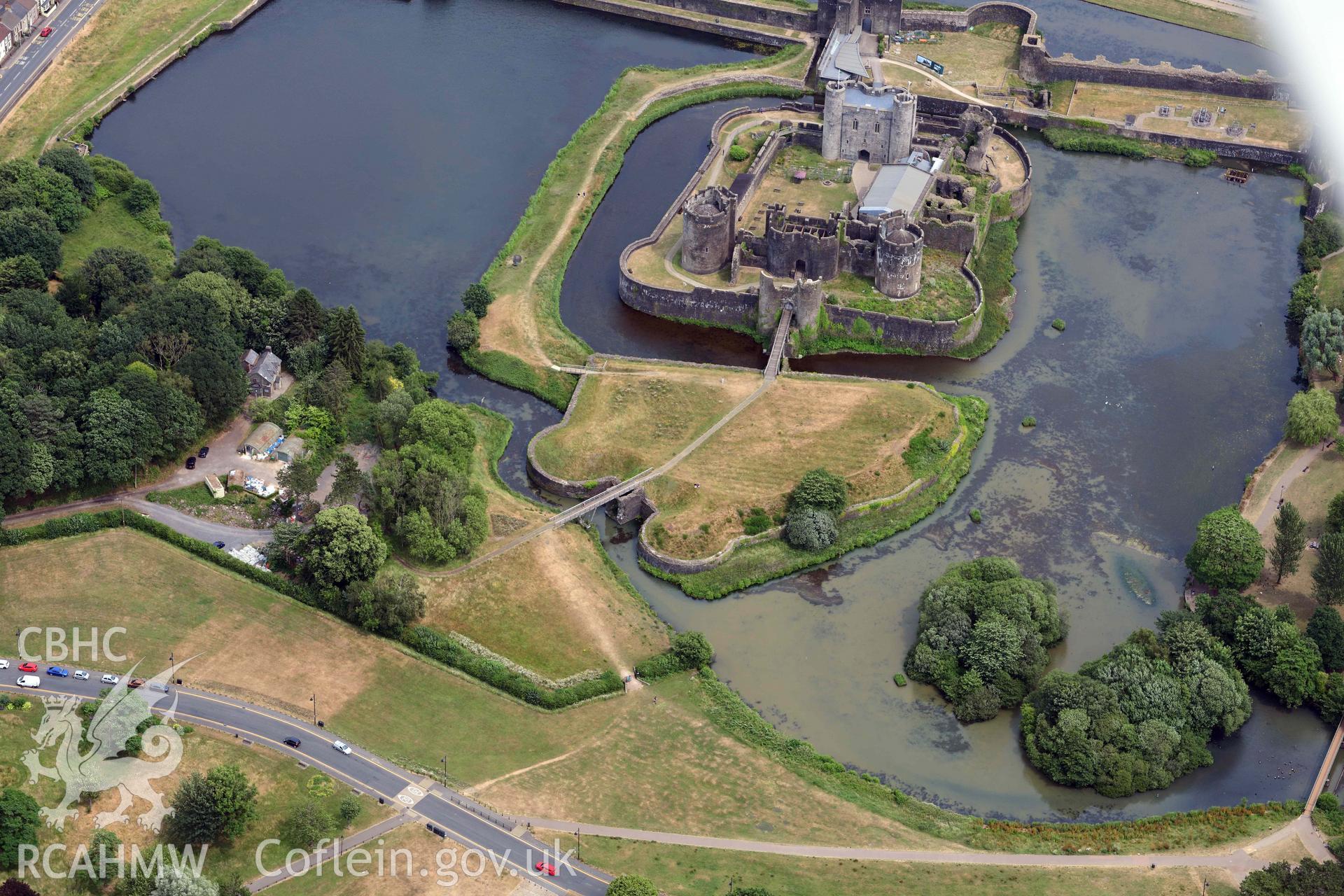 Aerial photograph of Caerphilly Castle. Oblique aerial photograph taken during the Royal Commission’s programme of archaeological aerial reconnaissance by Toby Driver on 26 June 2023