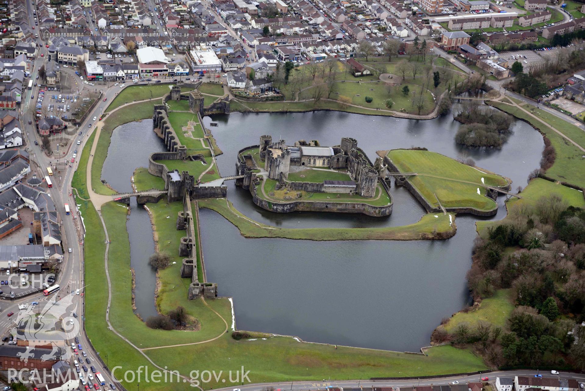 Aerial photograph of Caerphilly Castle. Oblique aerial photograph taken during the Royal Commission’s programme of archaeological aerial reconnaissance by Toby Driver on 20 March 2018