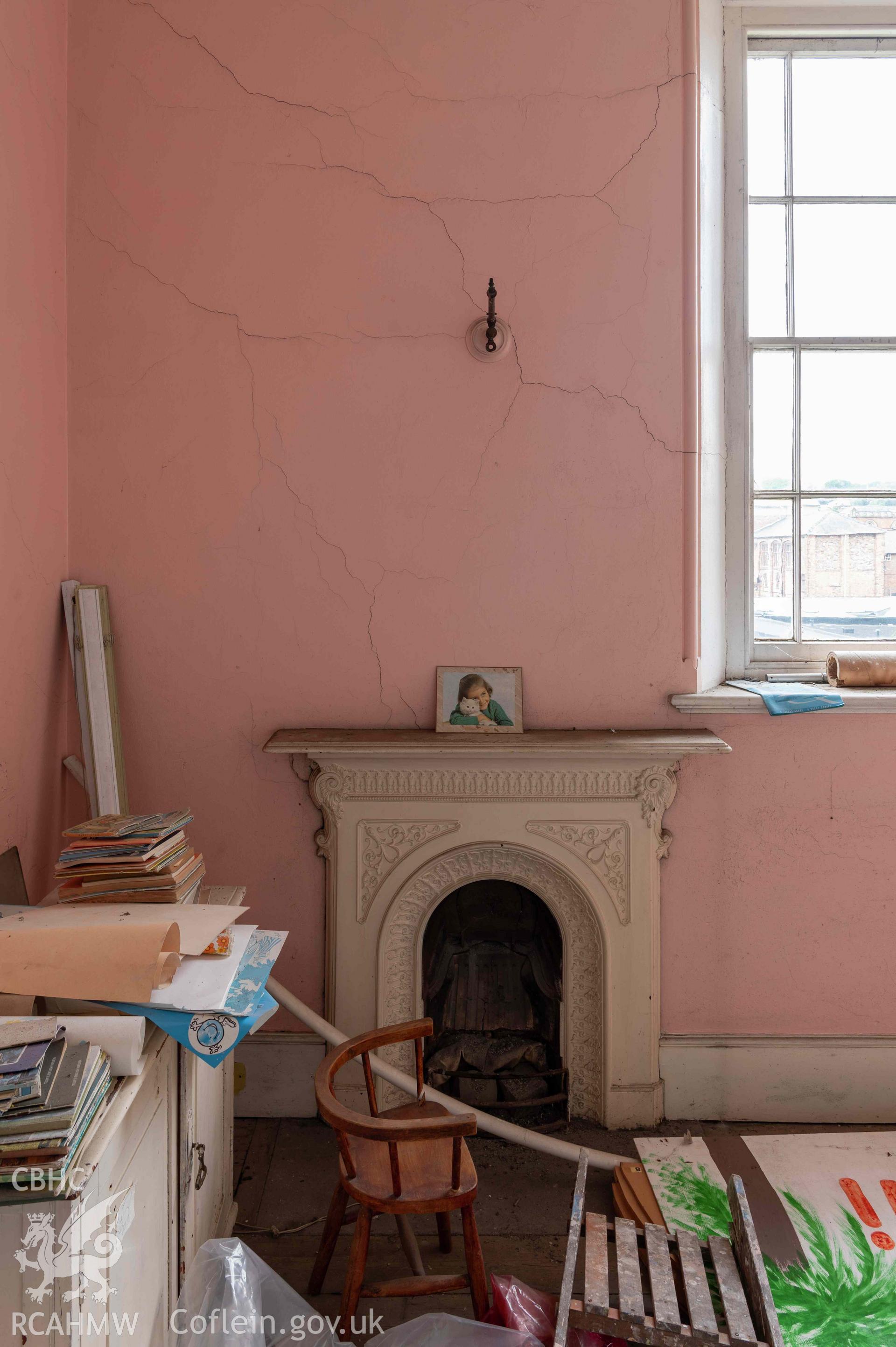 Capel Zion Baptist Chapel, Newtown - ground floor, south-central room, detail of fireplace.