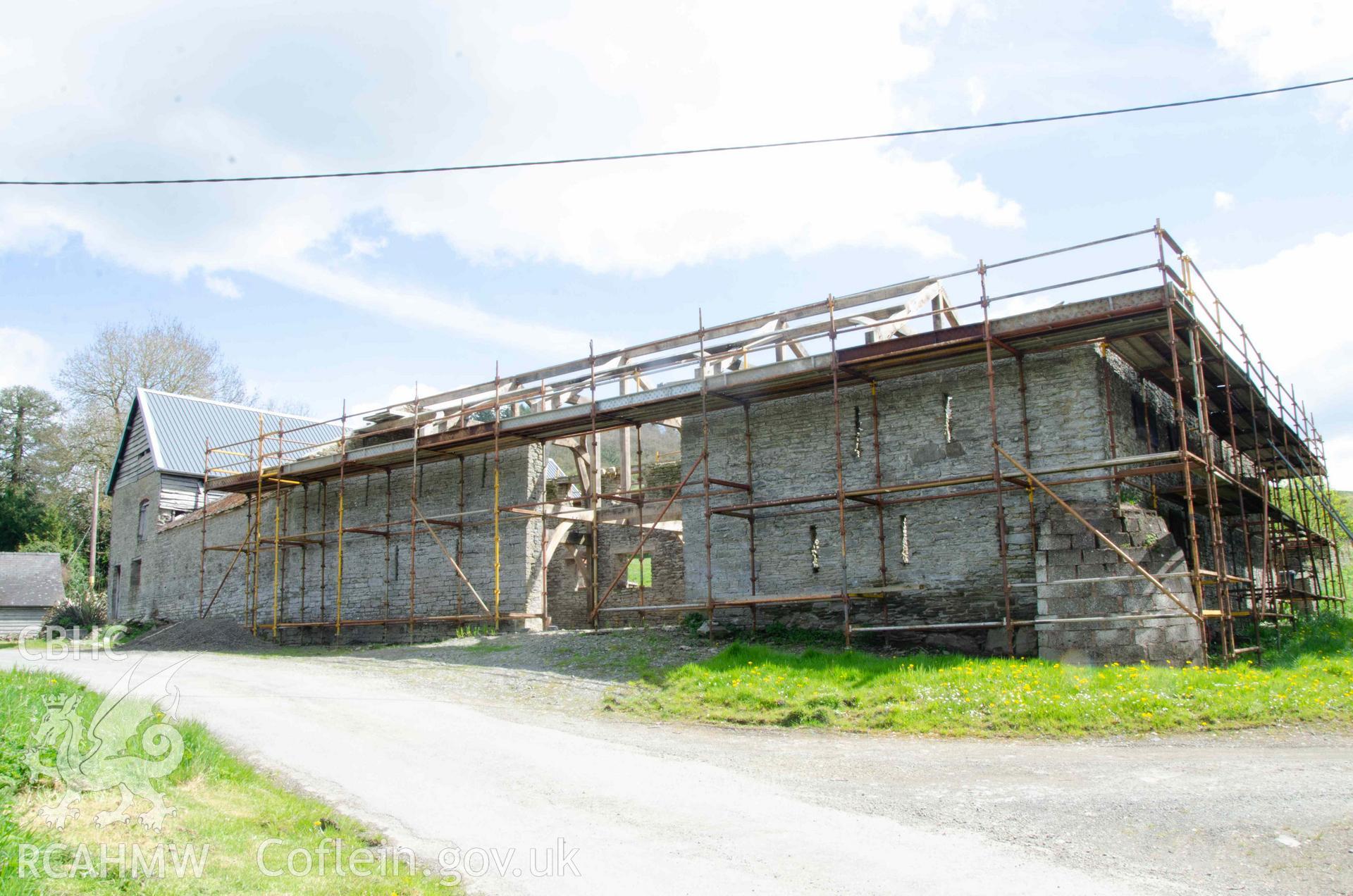 Photograph showing General view facing NE, from a Photographic Survey of outbuildings at Upper House Farm Evenjobb, submitted as part of Listed Building consent. Photograph taken by Christopher Welch in April/June 2024.
