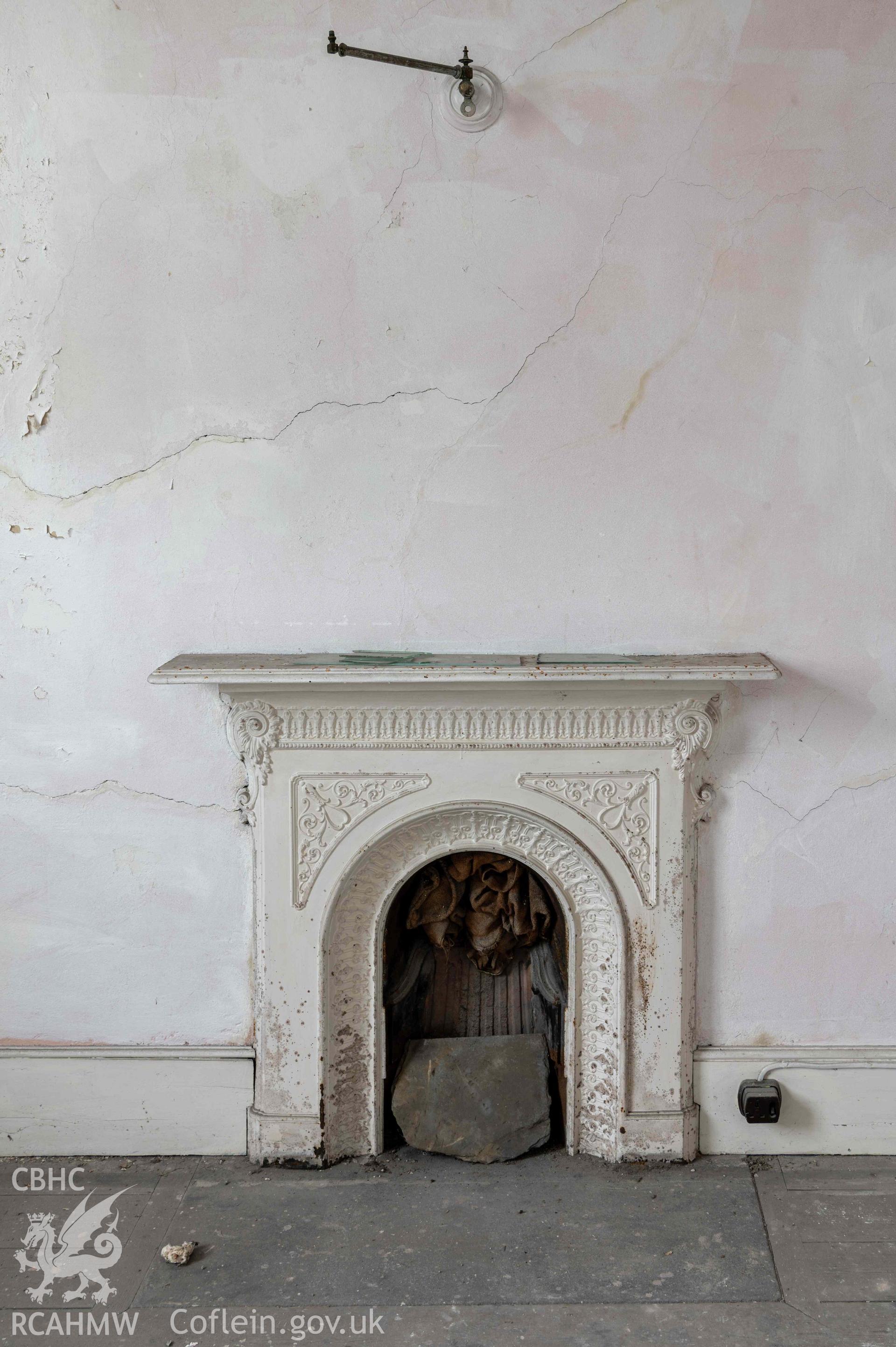 Capel Zion Baptist Chapel, Newtown - first floor, south-west room, detail of fireplace.