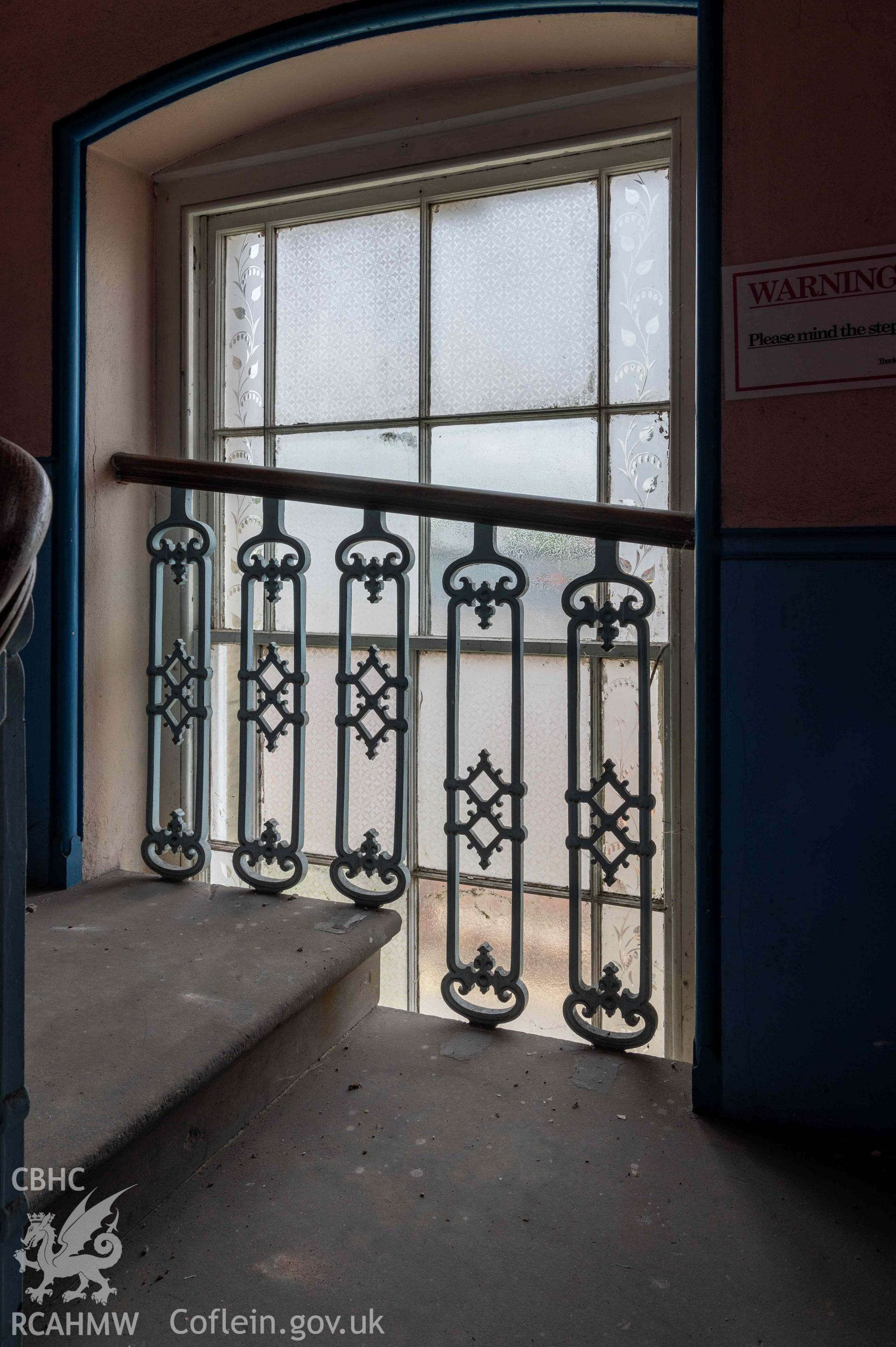 Capel Zion Baptist Chapel, Newtown - rear north-east staircase ground floor to first floor, half landing window.