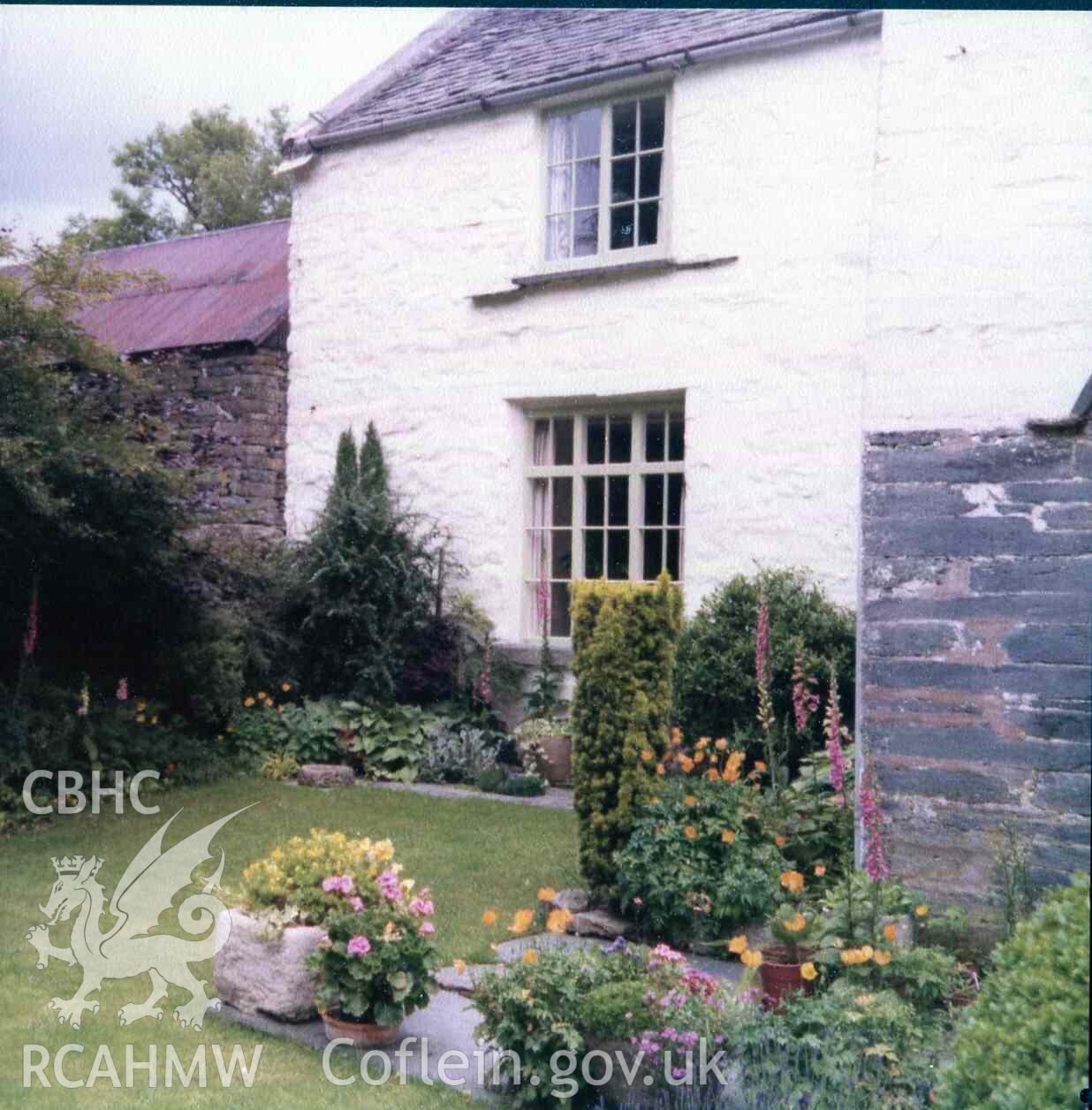 Windows looking onto the lawn at Hafod Dwyryd. Window frames painted grey-green. Photographed by Ronald and Joan Adams in the late 1970s.