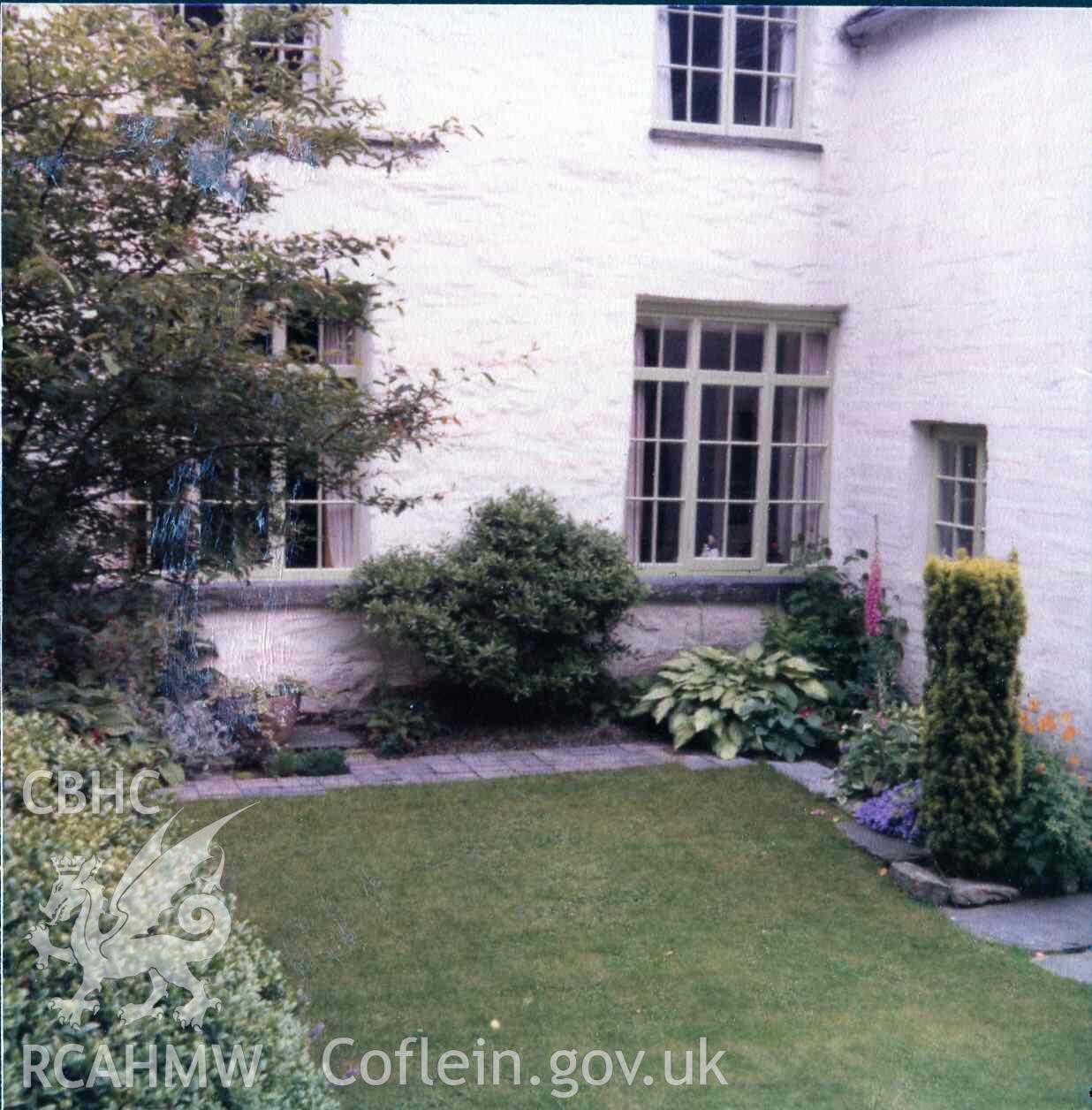 Windows looking onto the lawn at Hafod Dwyryd. Window frames painted grey-green. Photographed by Ronald and Joan Adams in the late 1970s.