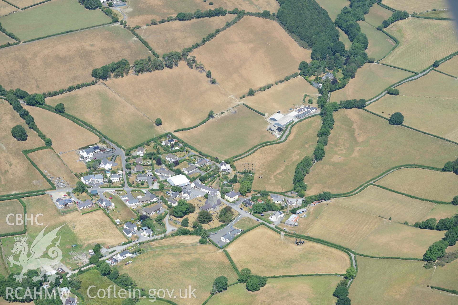 Llanfihangel y Creuddyn village. Oblique aerial photograph taken during the Royal Commission’s programme of archaeological aerial reconnaissance by Toby Driver on 10 July 2018.