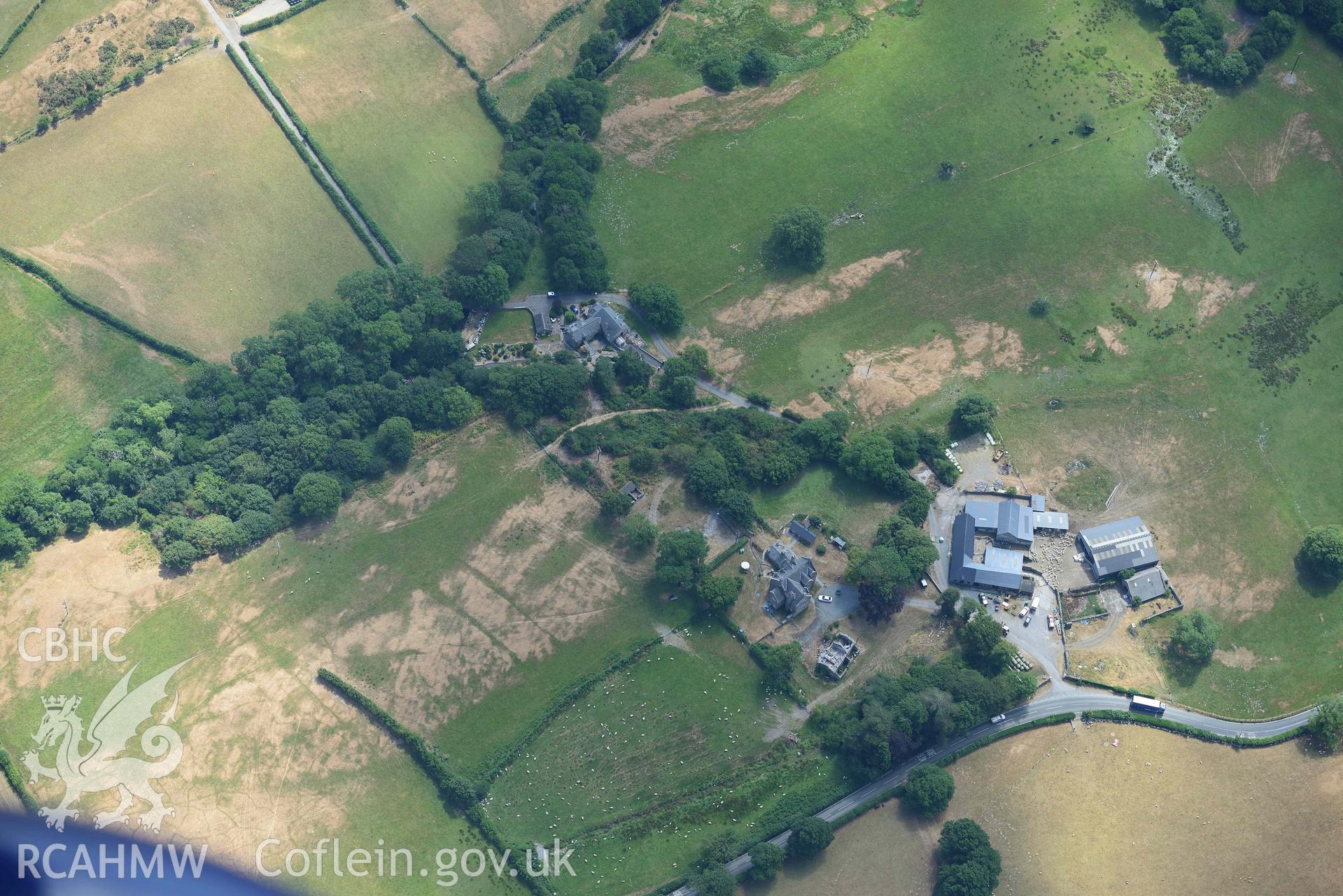 Dolaugwyn. Oblique aerial photograph taken during the Royal Commission’s programme of archaeological aerial reconnaissance by Toby Driver on 10 July 2018.