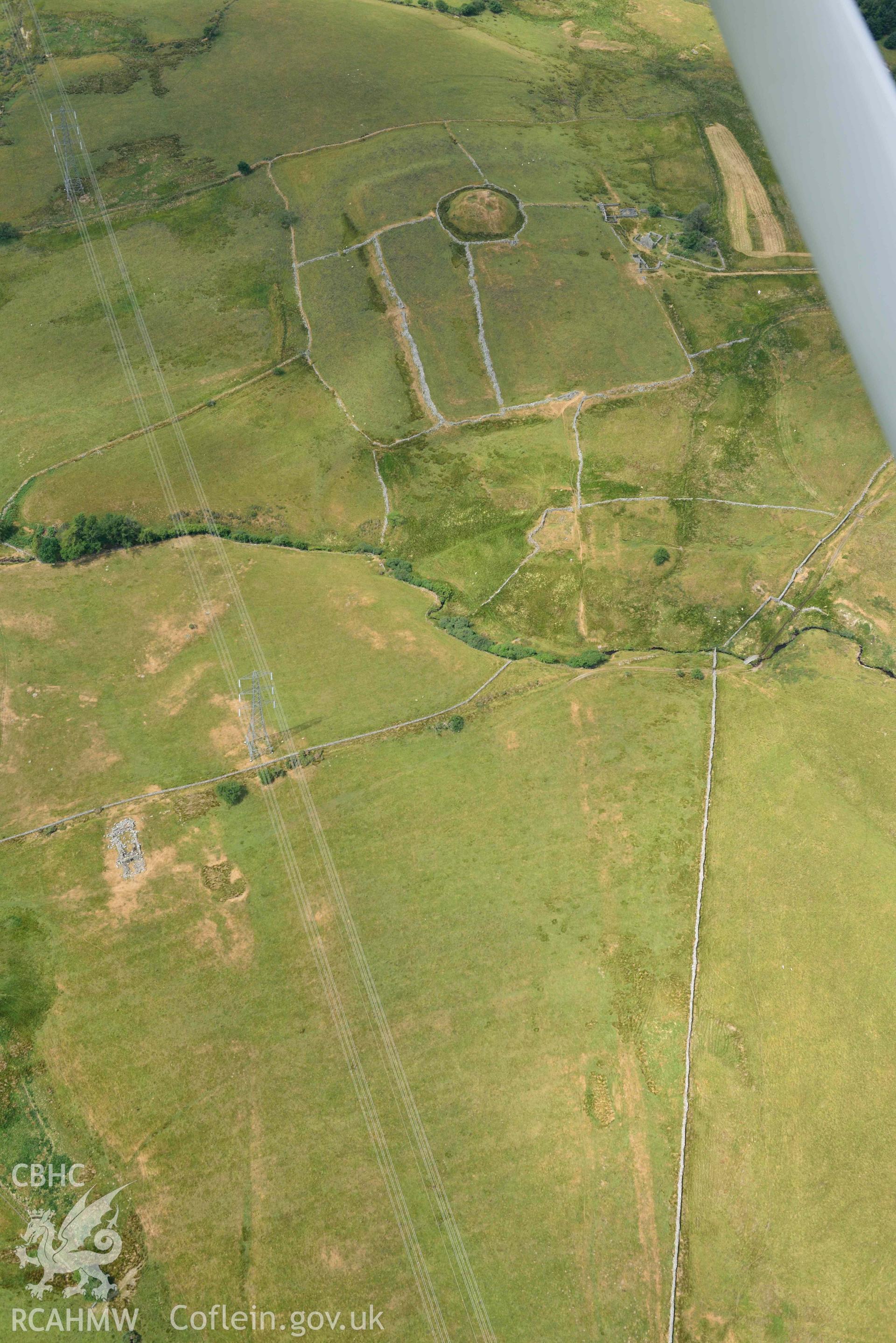 Tomen y Mur Roman Fort. Oblique aerial photograph taken during the Royal Commission’s programme of archaeological aerial reconnaissance by Toby Driver on 10 July 2018.