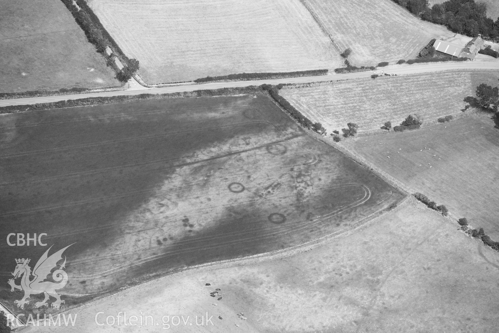 Detailed view of Bodnithoedd barrow cemetery, Botwnnog. Oblique black and white aerial photograph taken during the Royal Commission’s programme of archaeological aerial reconnaissance by Toby Driver on 10 July 2018.