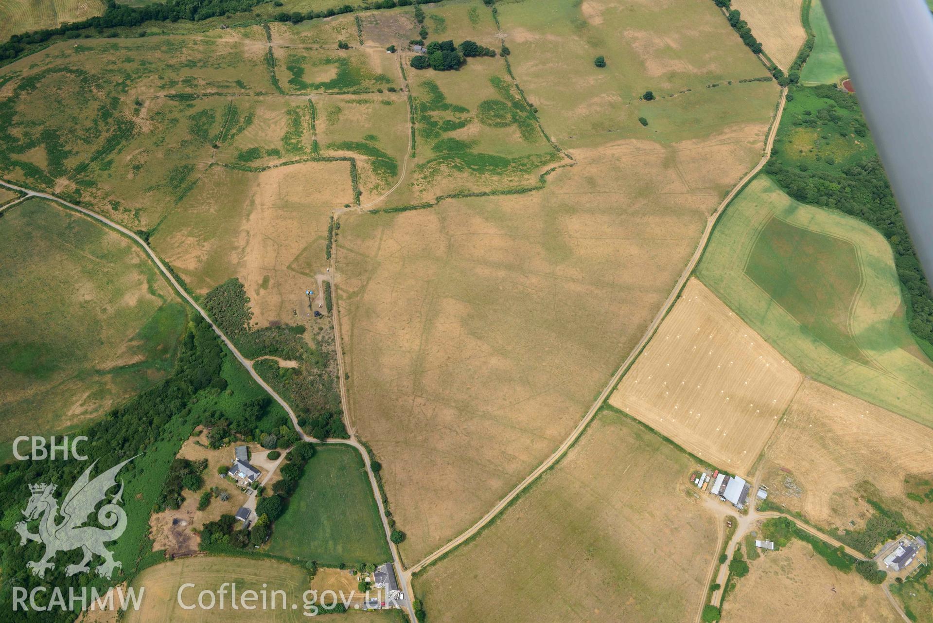 Traian rectangular enclosure. Oblique aerial photograph taken during the Royal Commission’s programme of archaeological aerial reconnaissance by Toby Driver on 10 July 2018.