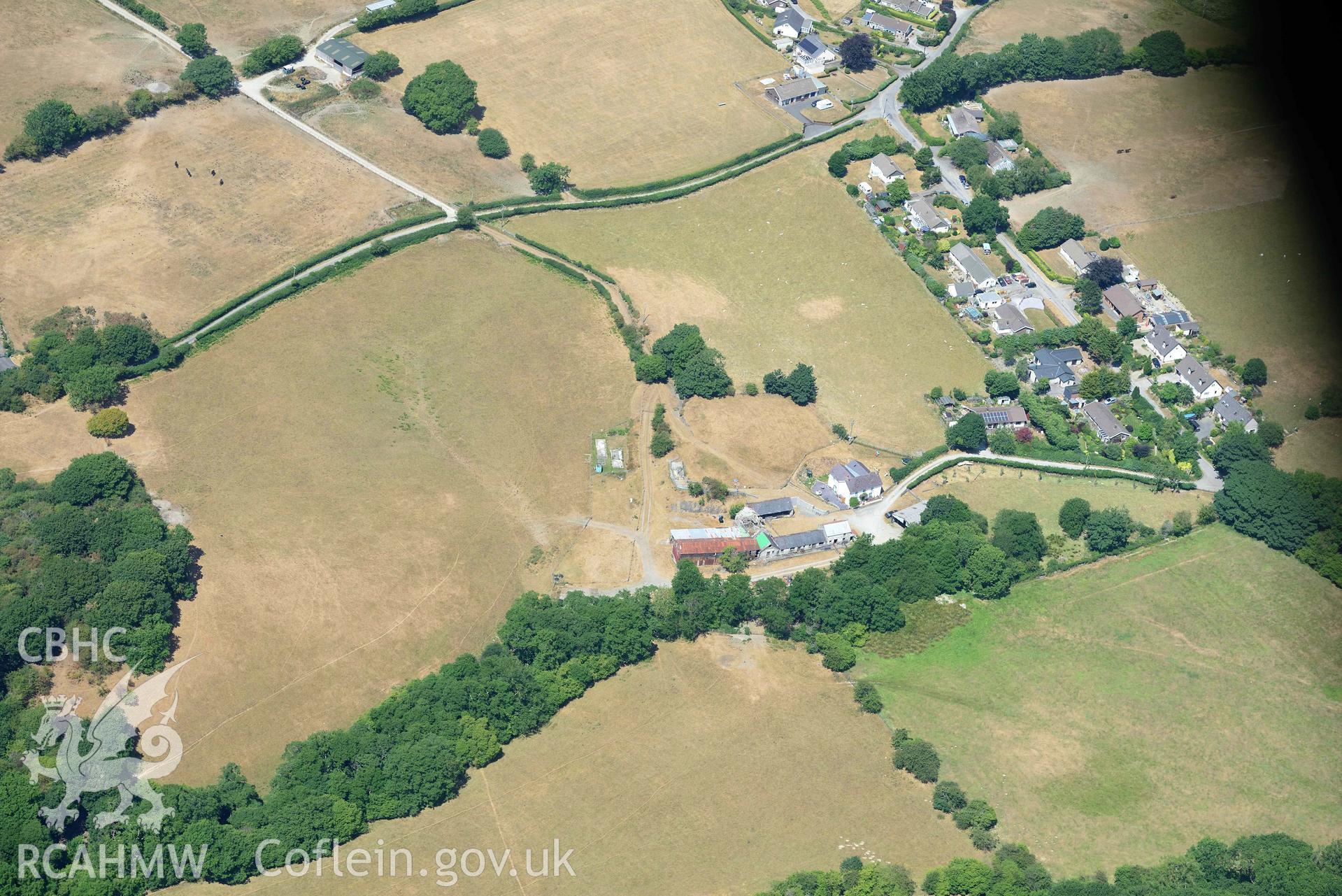 Goginan, with a view of Pen y Bryn (SN 683 809). Oblique aerial photograph taken during the Royal Commission’s programme of archaeological aerial reconnaissance by Toby Driver on 10 July 2018.