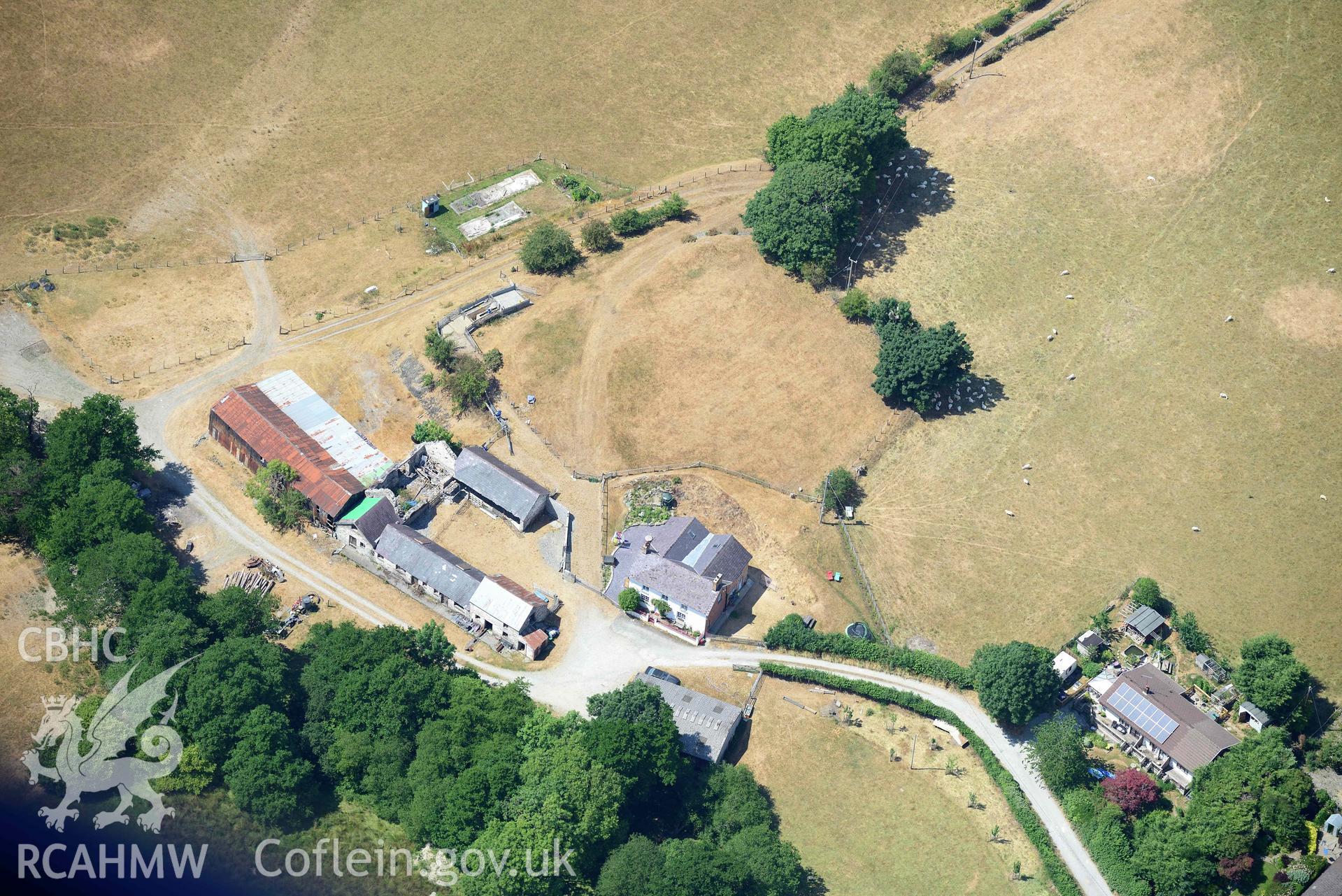 Goginan, with a view of Pen y Bryn (SN 683 809). Oblique aerial photograph taken during the Royal Commission’s programme of archaeological aerial reconnaissance by Toby Driver on 10 July 2018.