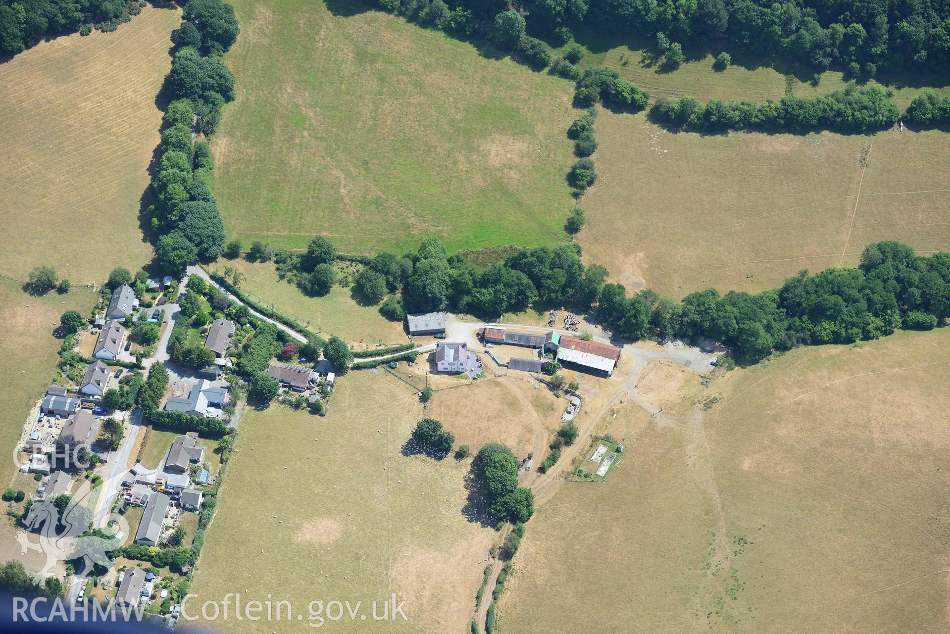 Goginan, with a view of Pen y Bryn (SN 683 809). Oblique aerial photograph taken during the Royal Commission’s programme of archaeological aerial reconnaissance by Toby Driver on 10 July 2018.