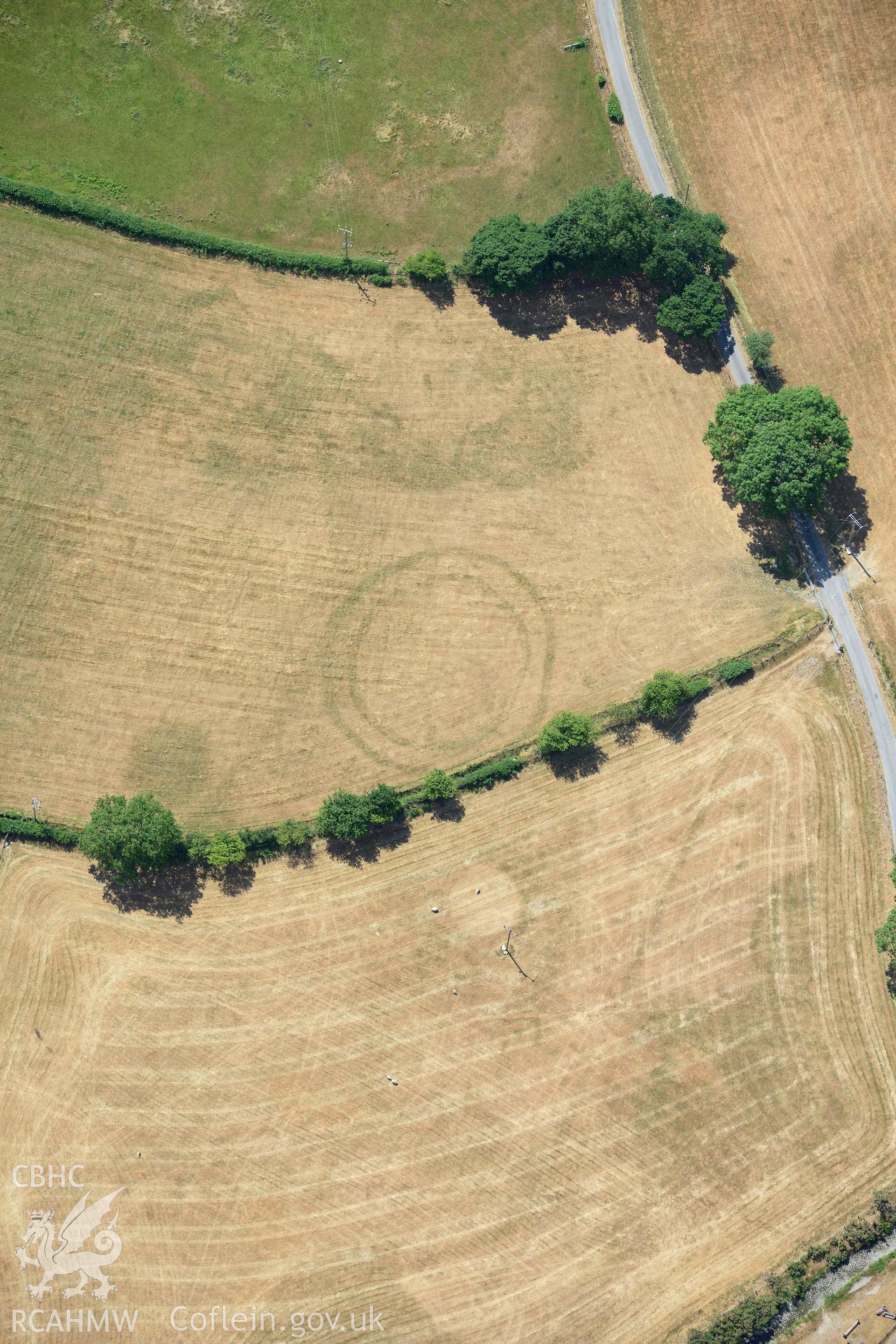 Detailed view of Pen y Wal Dollwen barrow and Dollwen barrow. Oblique aerial photograph taken during the Royal Commission’s programme of archaeological aerial reconnaissance by Toby Driver on 10 July 2018.