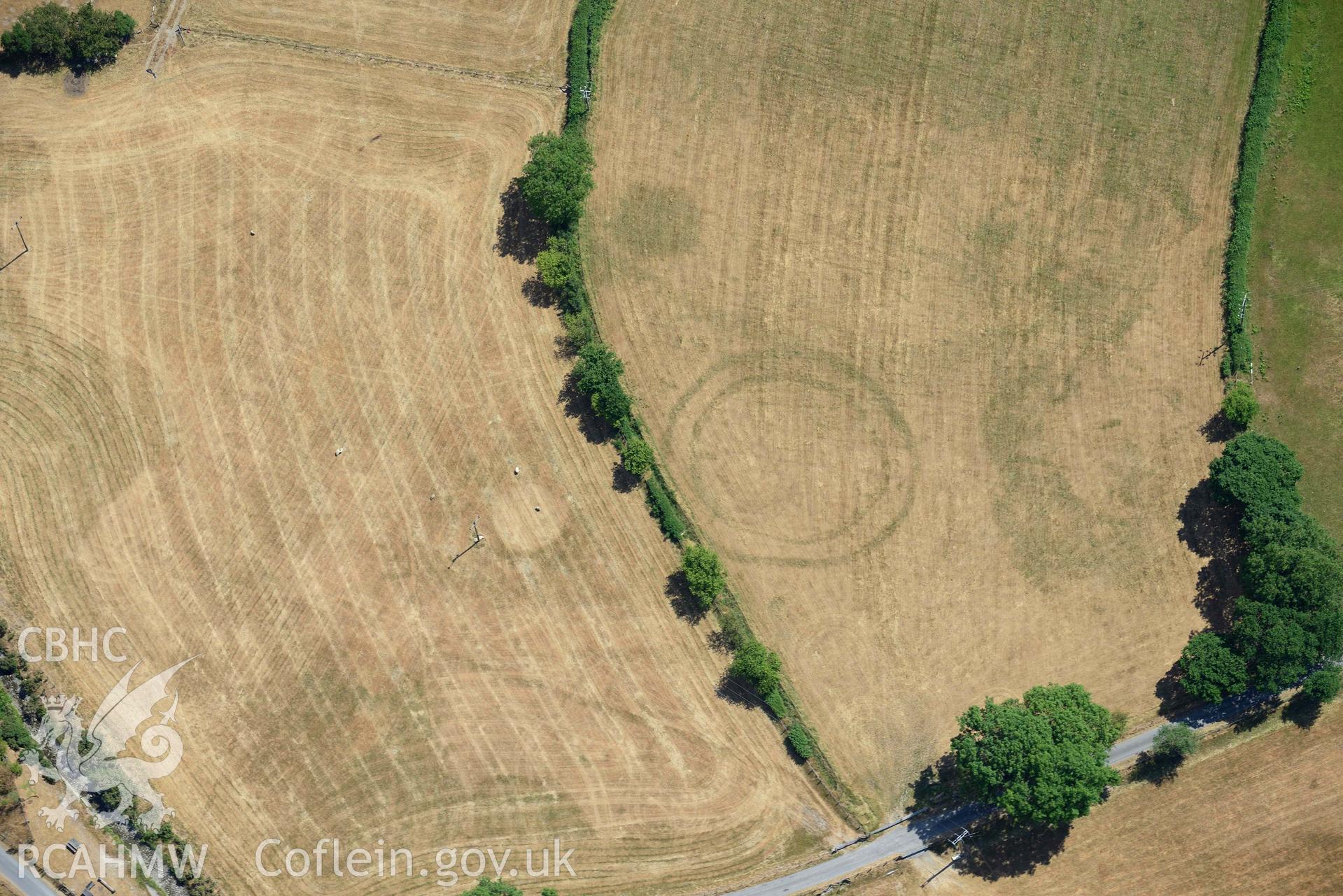 Pen y Wal Dollwen barrow and Dollwen barrow. Oblique aerial photograph taken during the Royal Commission’s programme of archaeological aerial reconnaissance by Toby Driver on 10 July 2018.