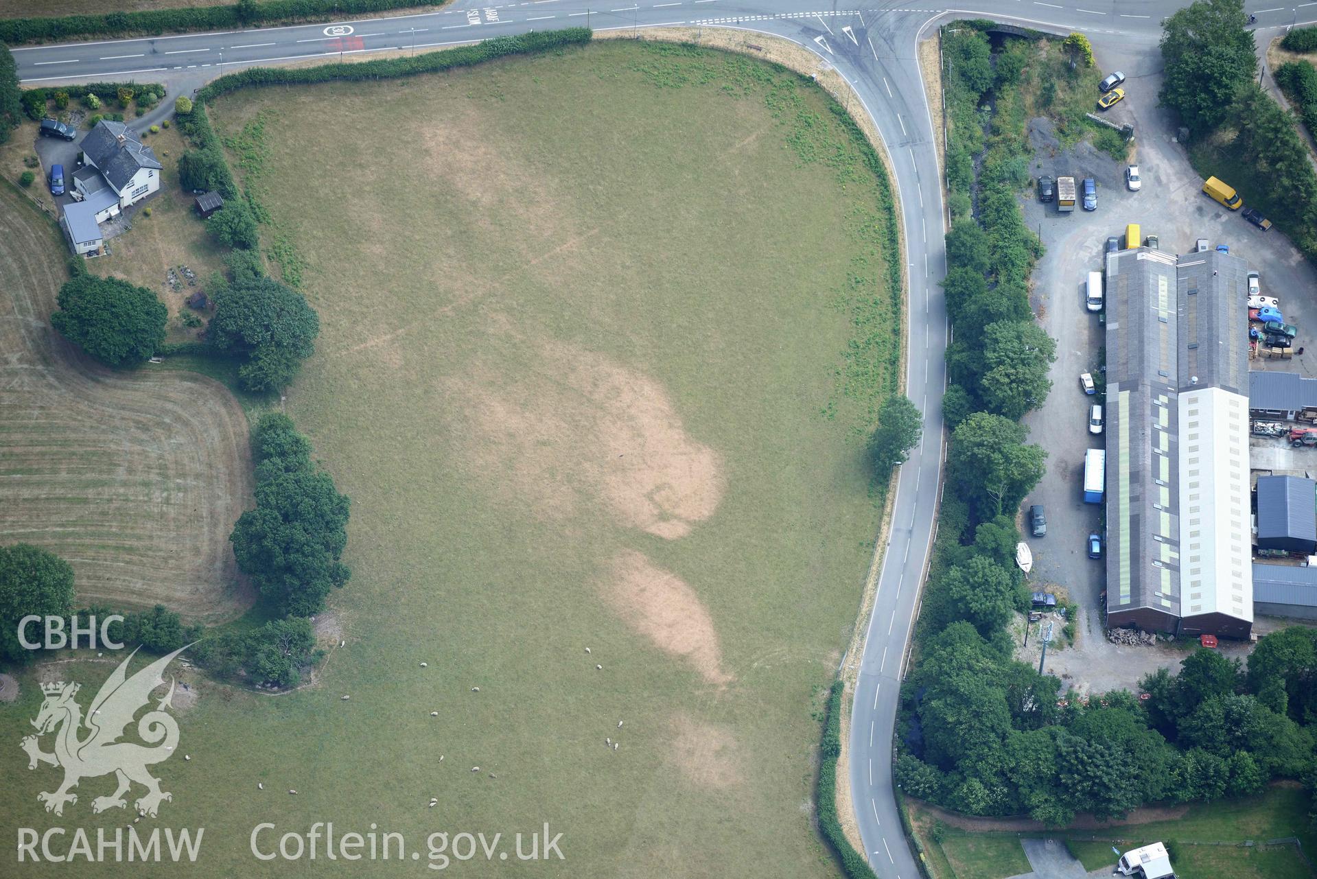 Bryncrug square barrow. Oblique aerial photograph taken during the Royal Commission’s programme of archaeological aerial reconnaissance by Toby Driver on 10 July 2018.