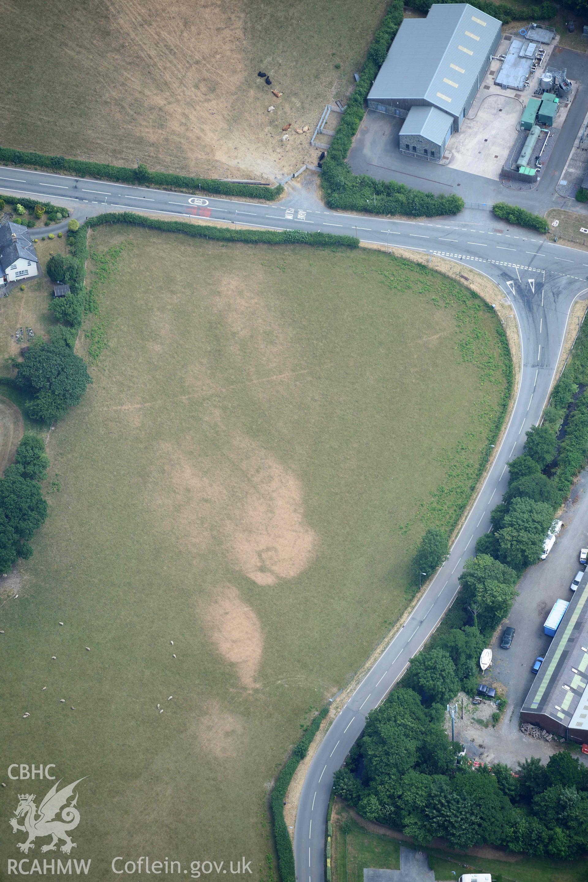 Bryncrug square barrow. Oblique aerial photograph taken during the Royal Commission’s programme of archaeological aerial reconnaissance by Toby Driver on 10 July 2018.