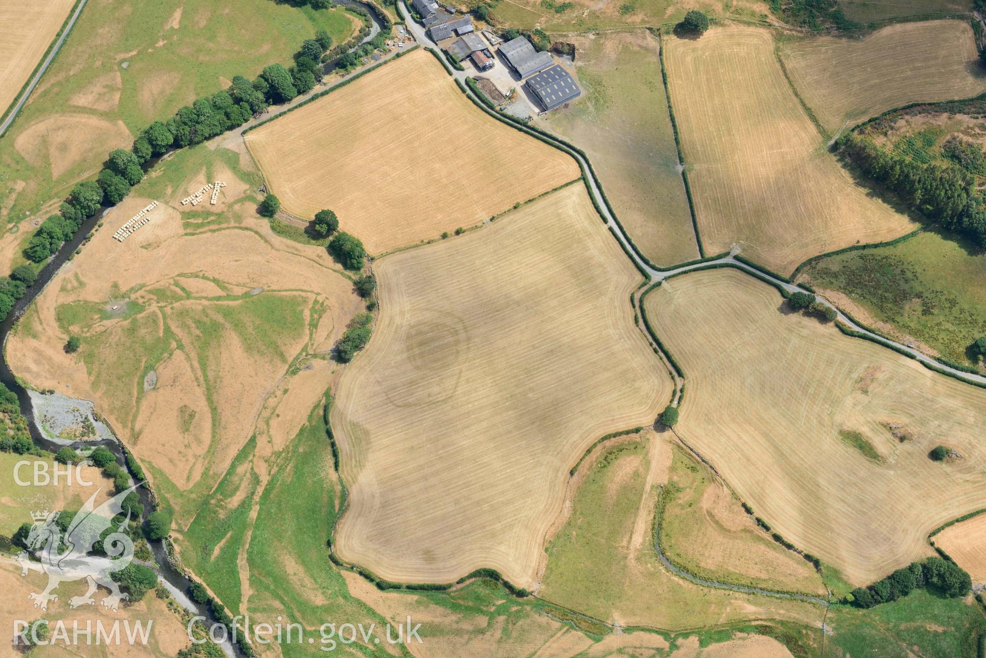 Detailed view of Dyffryn Dysynni defended enclosure. Oblique aerial photograph taken during the Royal Commission’s programme of archaeological aerial reconnaissance by Toby Driver on 10 July 2018.