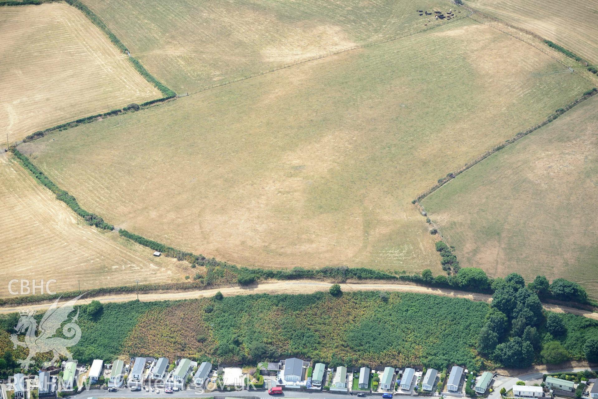Detailed view of Fach Farm defended enclosure, Abersoch. Oblique aerial photograph taken during the Royal Commission’s programme of archaeological aerial reconnaissance by Toby Driver on 10 July 2018.
