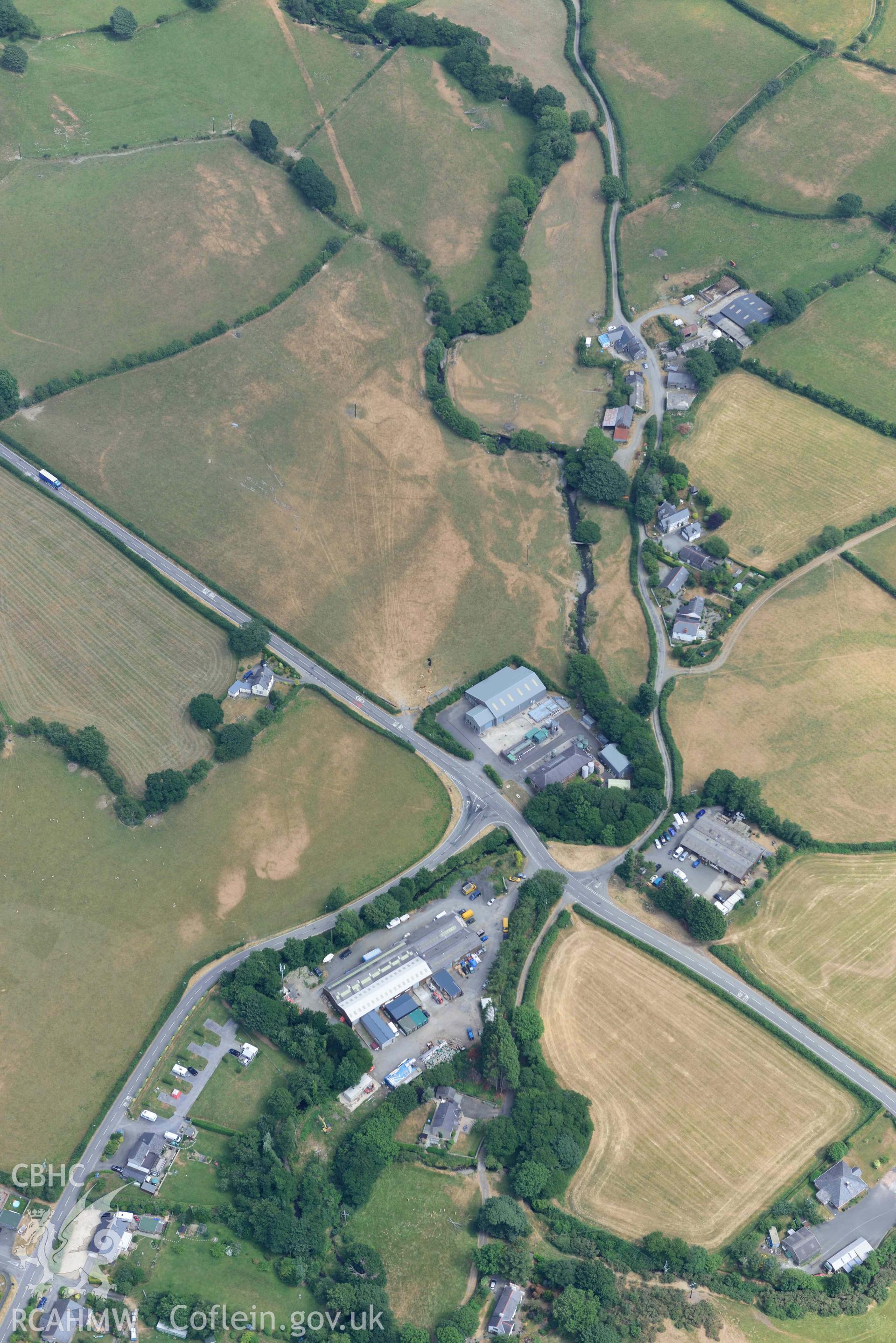 Bryncrug Pont y Felindre cropmarks. Oblique aerial photograph taken during the Royal Commission’s programme of archaeological aerial reconnaissance by Toby Driver on 10 July 2018.