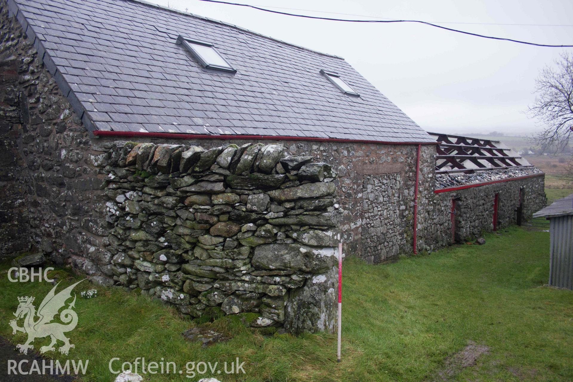 Photograph showing SE elevation, from an Historic Building Record Level 1 for Outbuilding at Penrhyn, Rhydlydan, Pentrefoelas, carried out by Aeon Archaeology in 2022. Report no: 0327. Project code A0348.1.