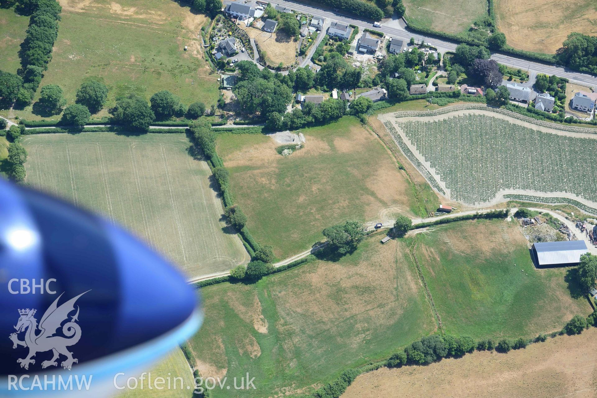 Detailed view of Dolypandy round barrow. Oblique aerial photograph taken during the Royal Commission’s programme of archaeological aerial reconnaissance by Toby Driver on 10 July 2018.