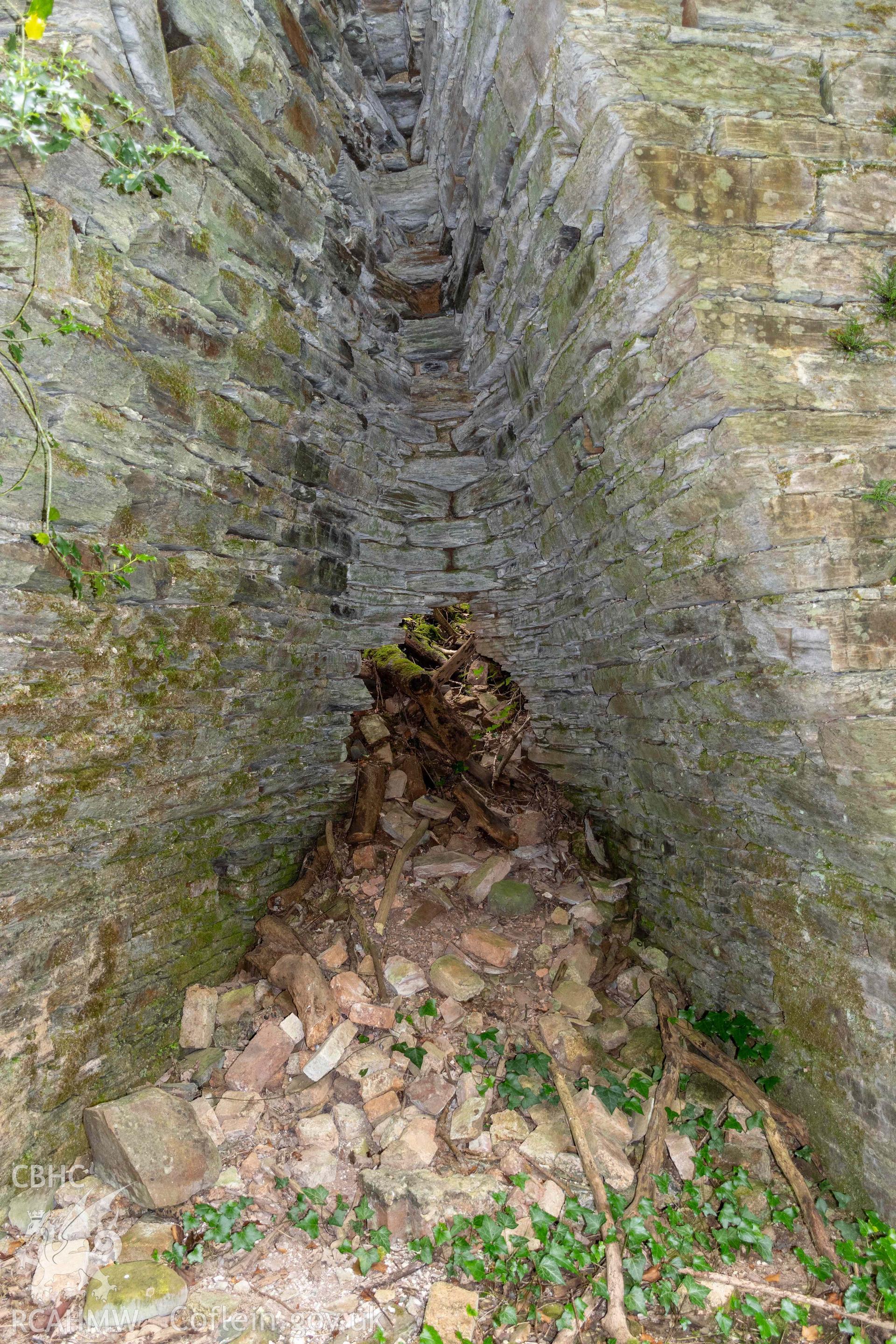 Back of east kiln-eye showing collapse and hole into crucible on the east face.