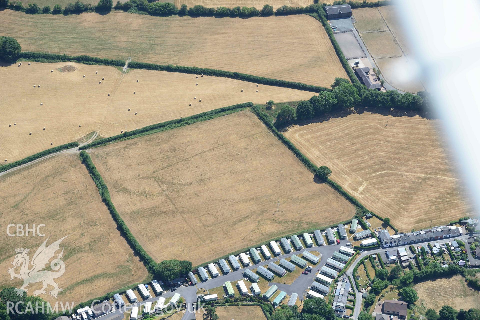 Detailed view of Dolypandy round barrow. Oblique aerial photograph taken during the Royal Commission’s programme of archaeological aerial reconnaissance by Toby Driver on 10 July 2018.