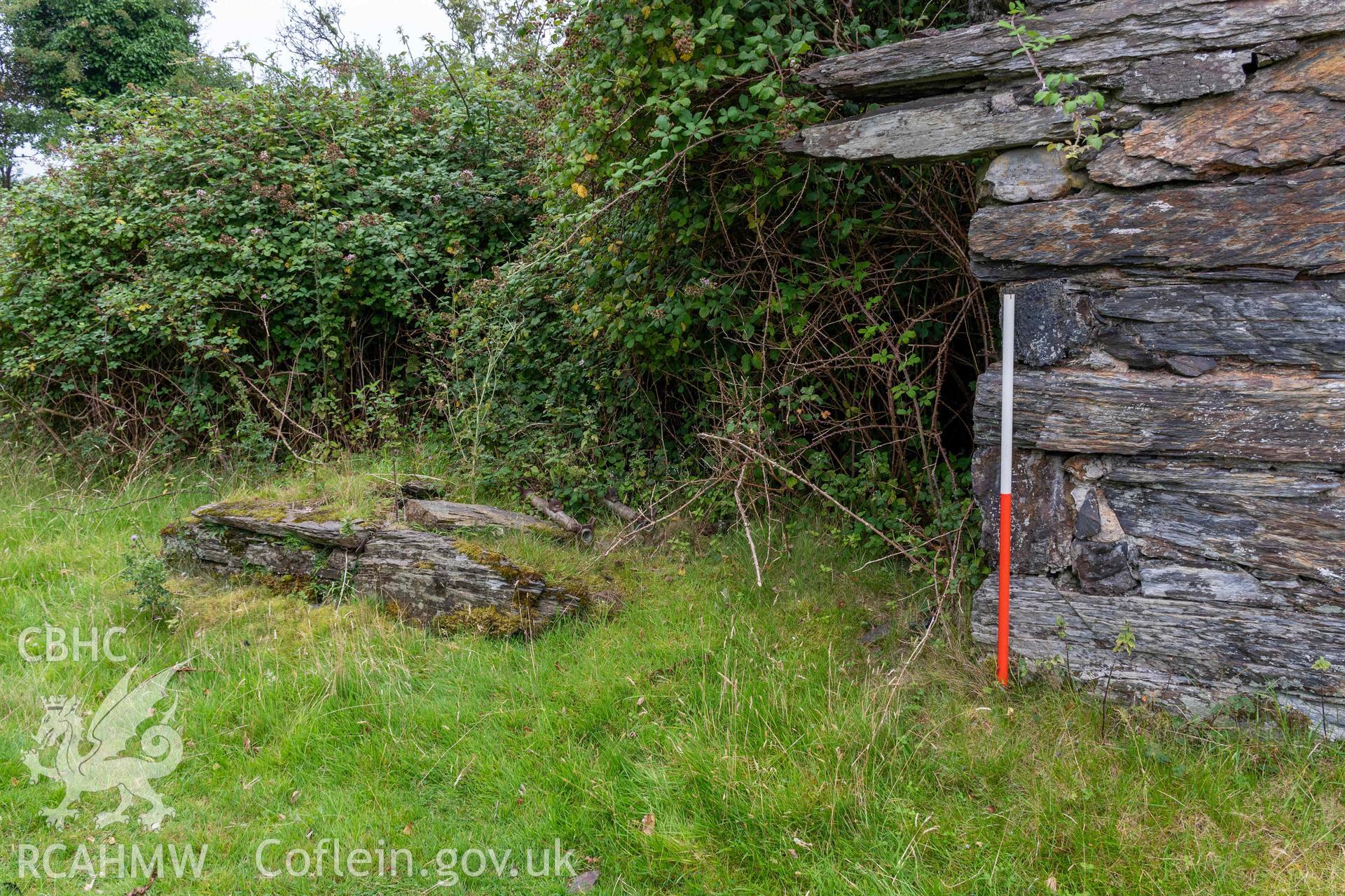 Lime Kiln, Llechollwyn. Lean-to adjoining east face of kiln (with scale).
