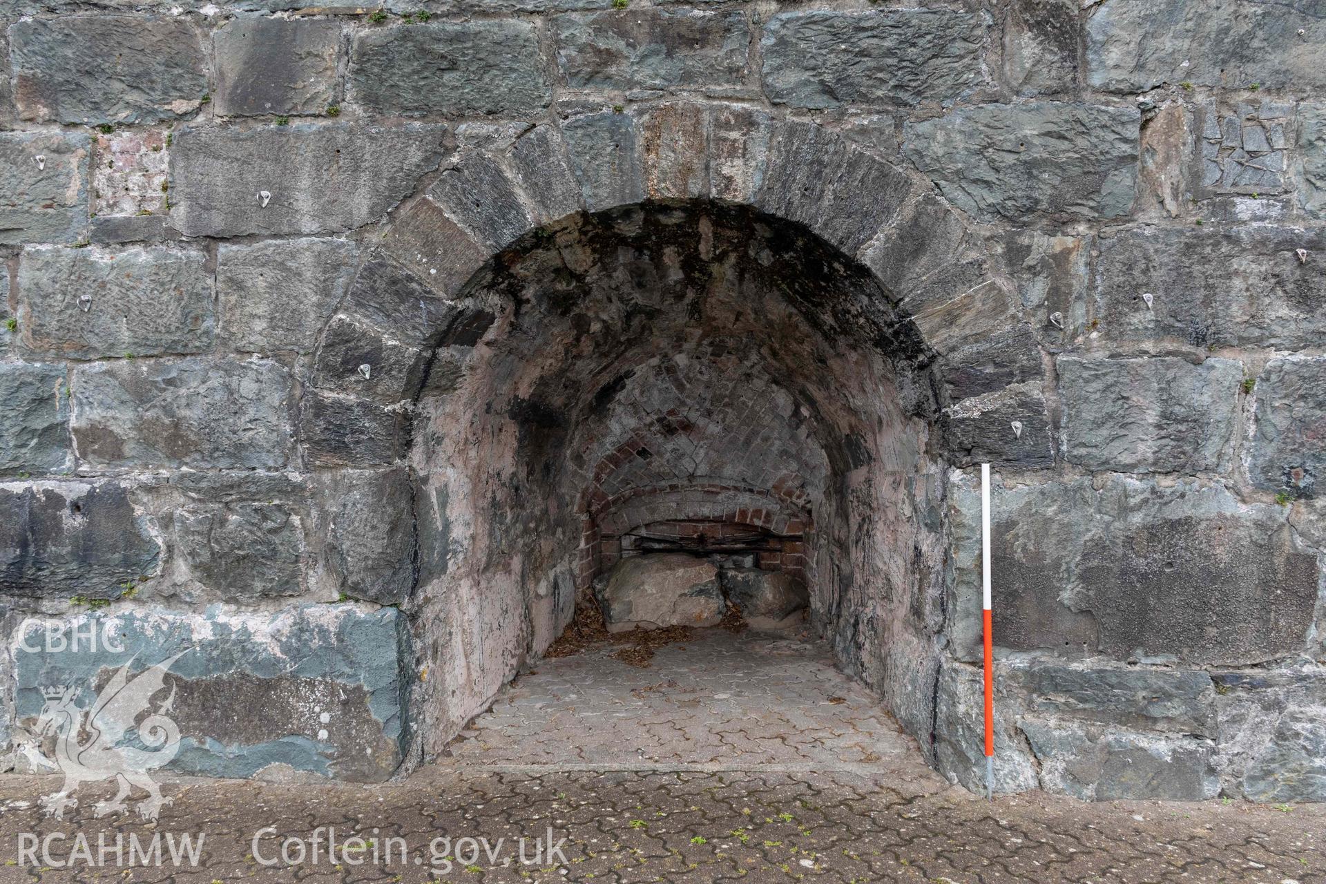 Lime Kiln, Pensarn Wharf. Southwest face. kiln eye (with scale).