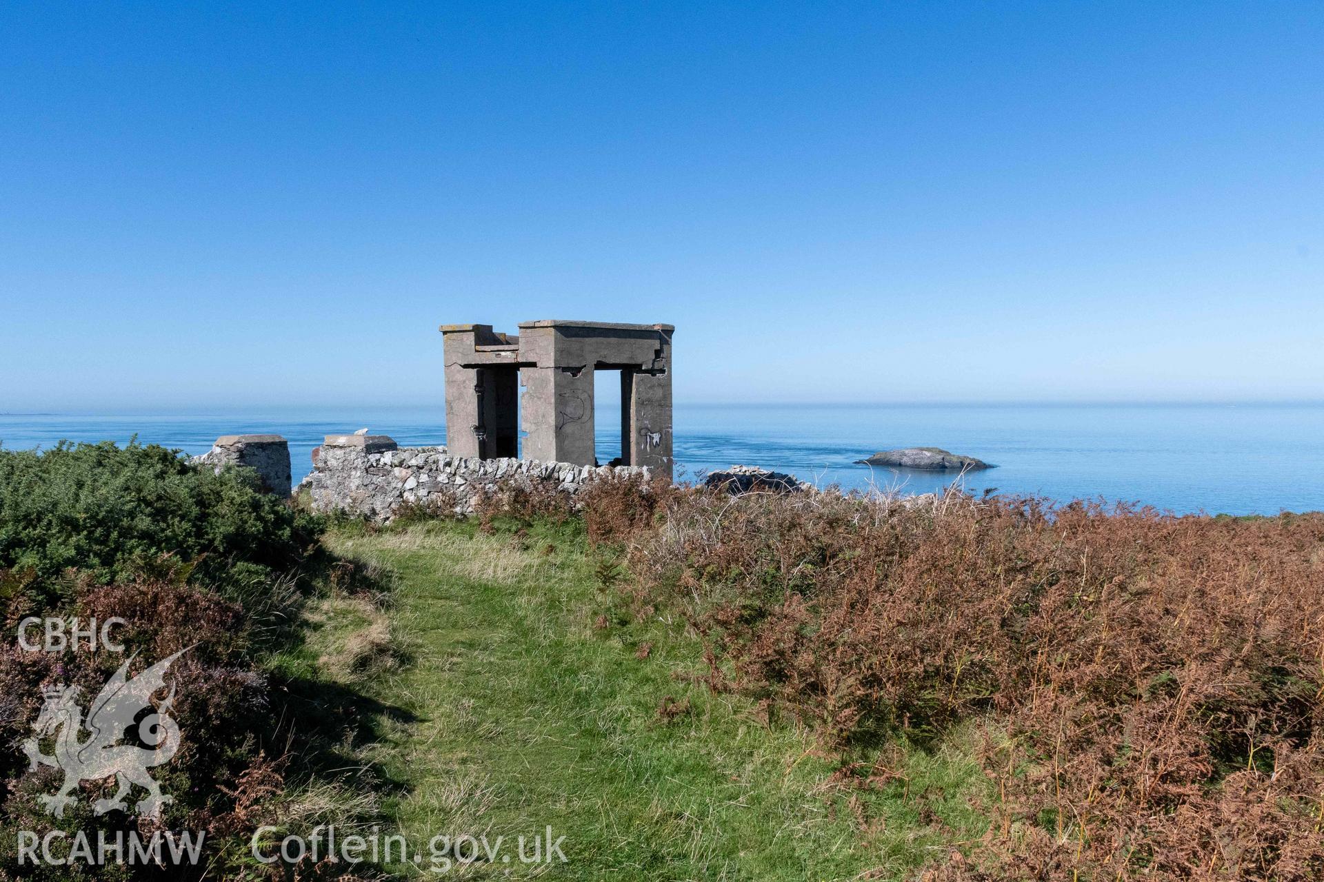 Coronation Tower, Llanlleiana Head. General view of tower and enclosure wall from the southeast.
