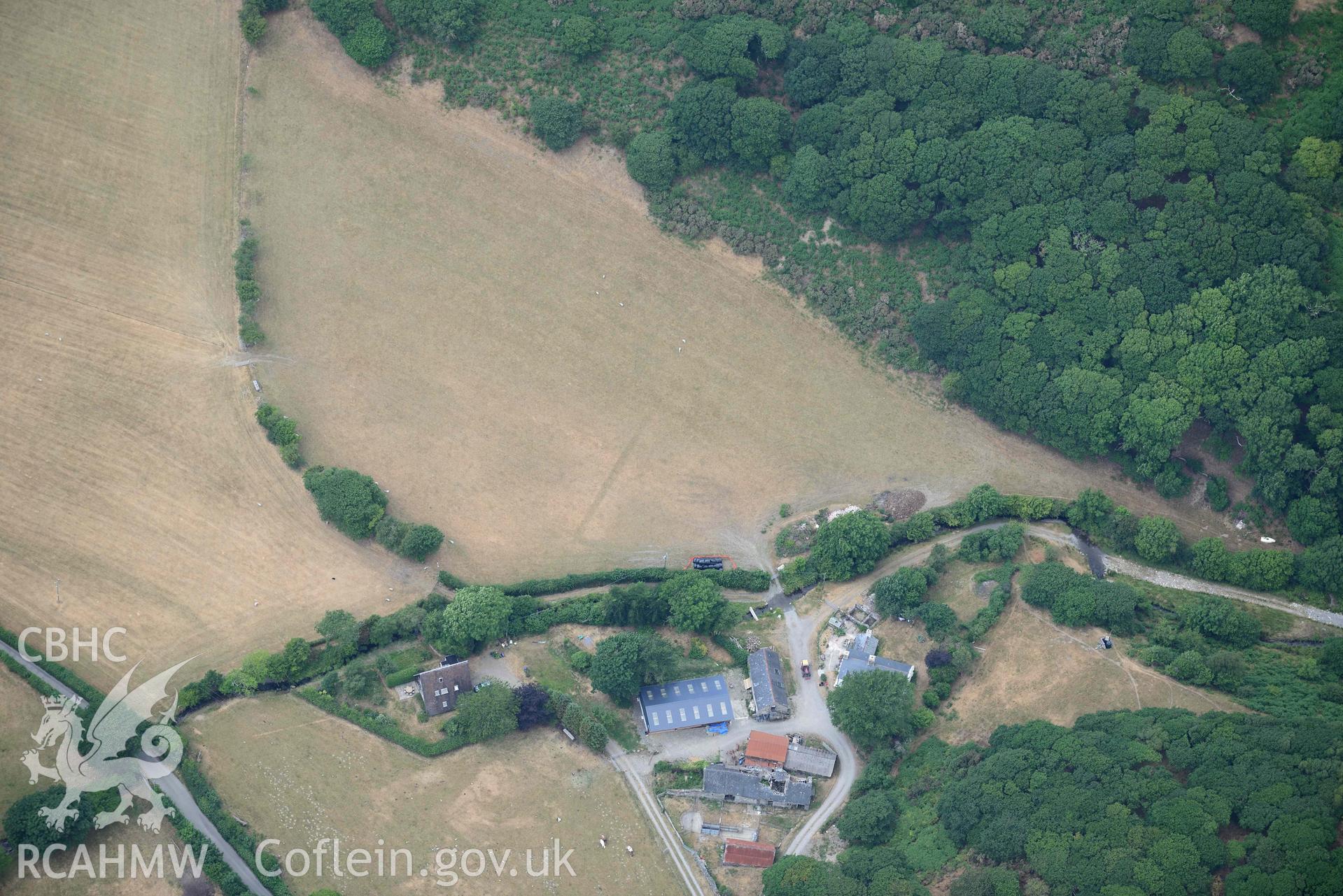 Bryn Dinas rectangular enclosure. Oblique aerial photograph taken during the Royal Commission’s programme of archaeological aerial reconnaissance by Toby Driver on 10 July 2018.