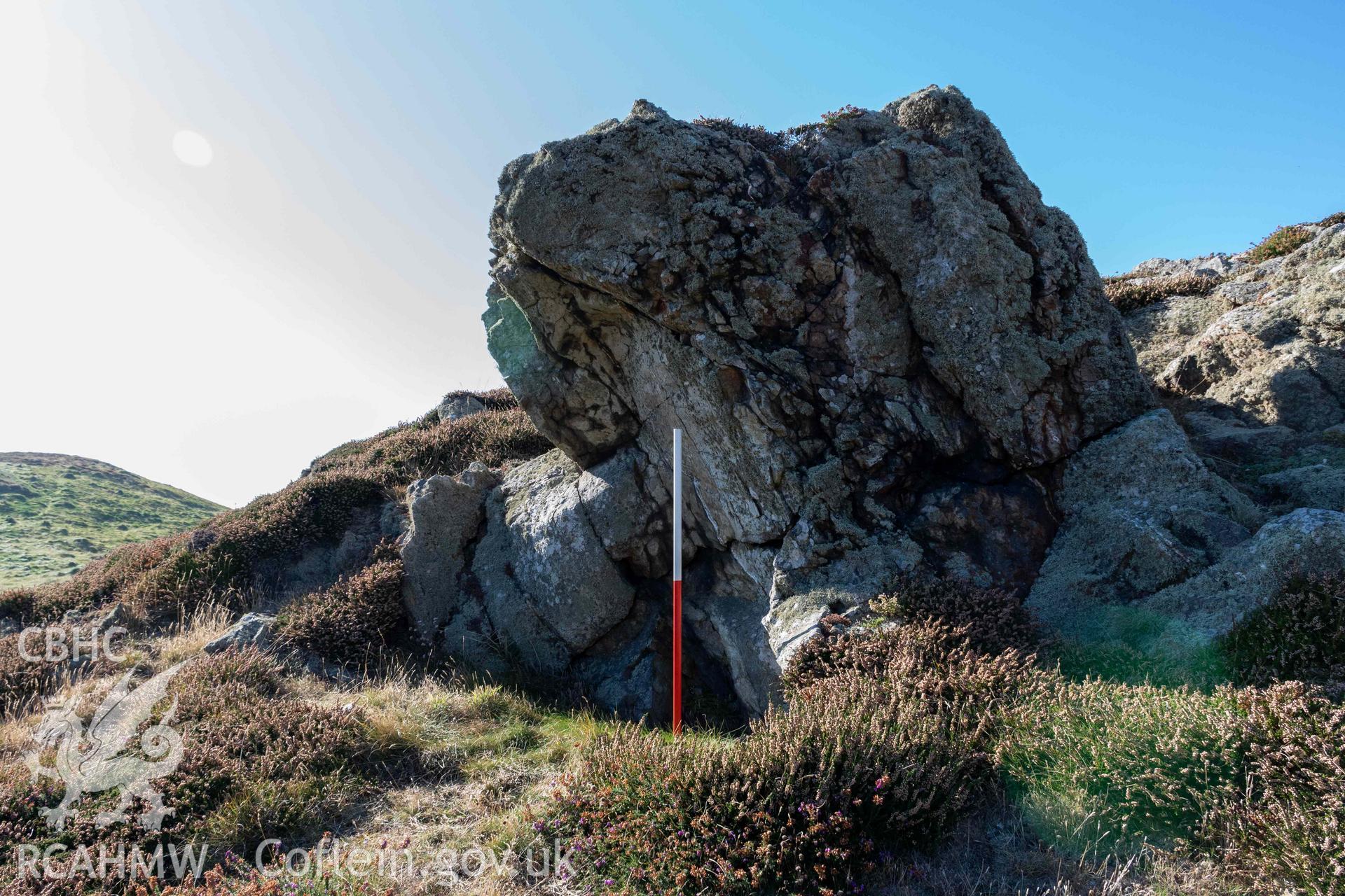 Ynys y Fydlyn Coastal Promontory Fort. Overhanging rock outcrops on eastern islet (with scale).